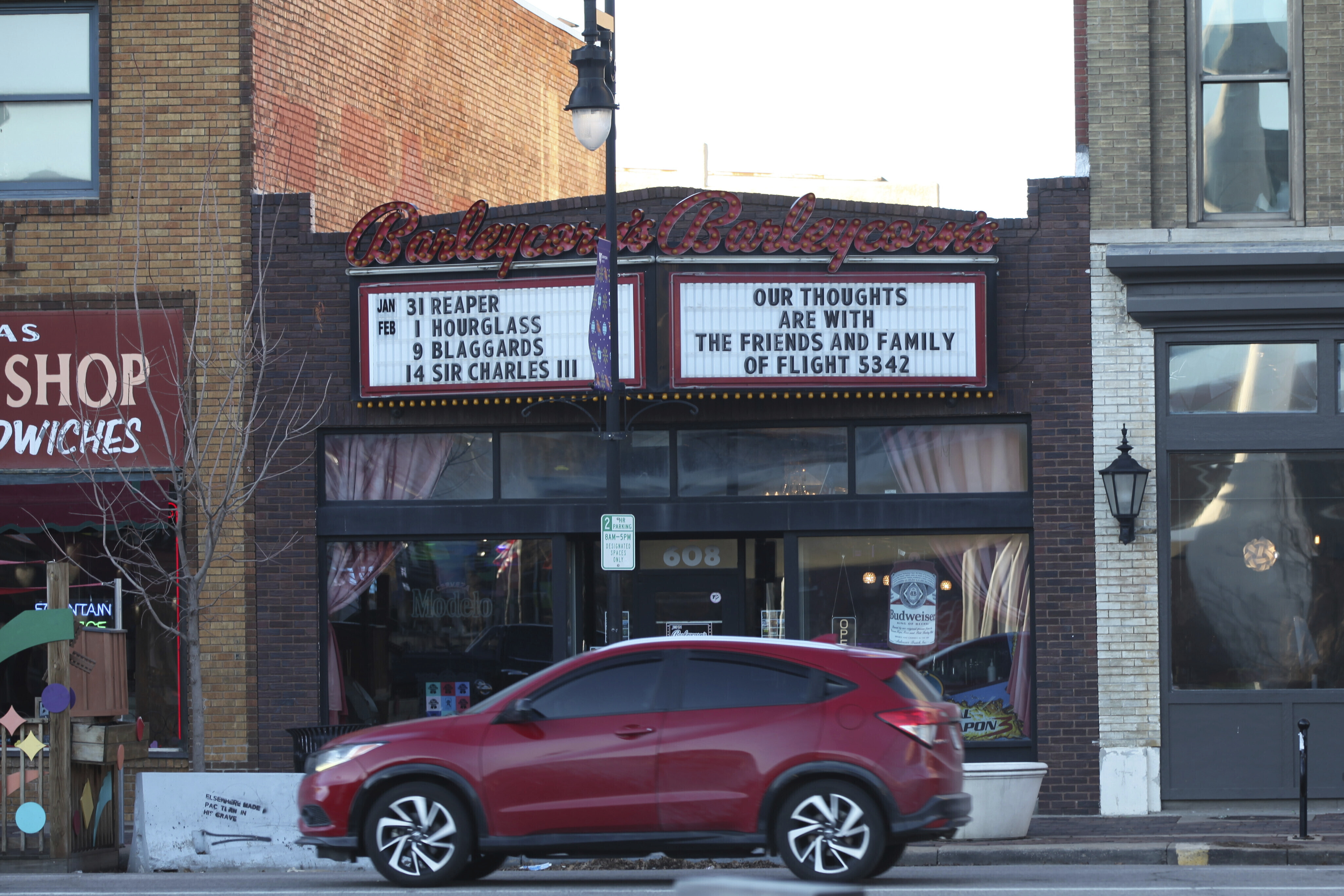 Barleycorn's, a restaurant, bar and live music venue, uses its marquee to express its sympathy for friends and family of the victims of a deadly crash involving a commercial airliner flying from Wichita and an Army helicopter in Washington, Friday, Jan. 31, 2025, in Wichita, Kansas.