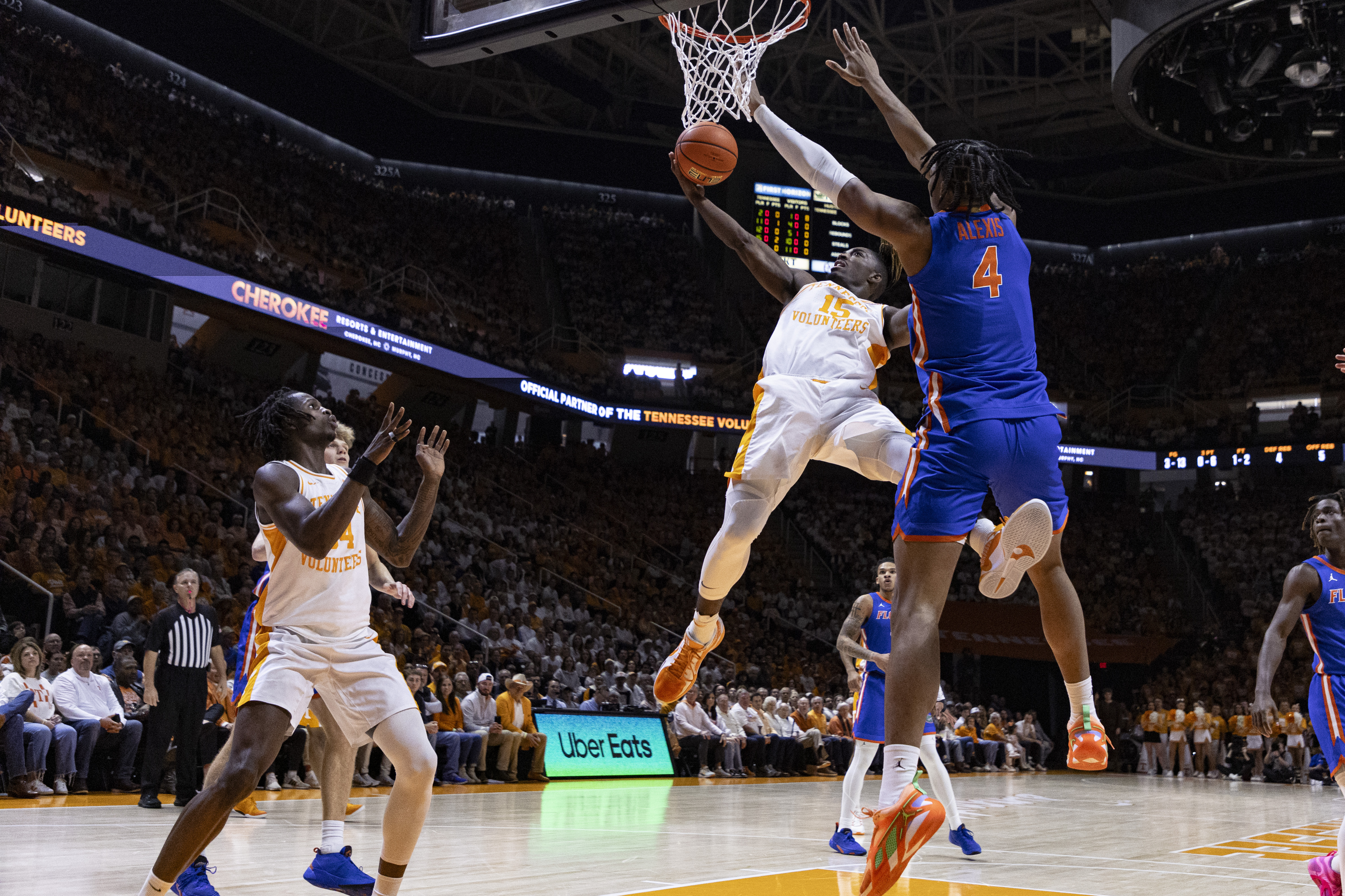 Tennessee guard Jahmai Mashack (15) shoots as he' s defended by Florida forward Sam Alexis (4)during the first half of an NCAA college basketball game Saturday, Feb. 1, 2025, in Knoxville, Tenn. 