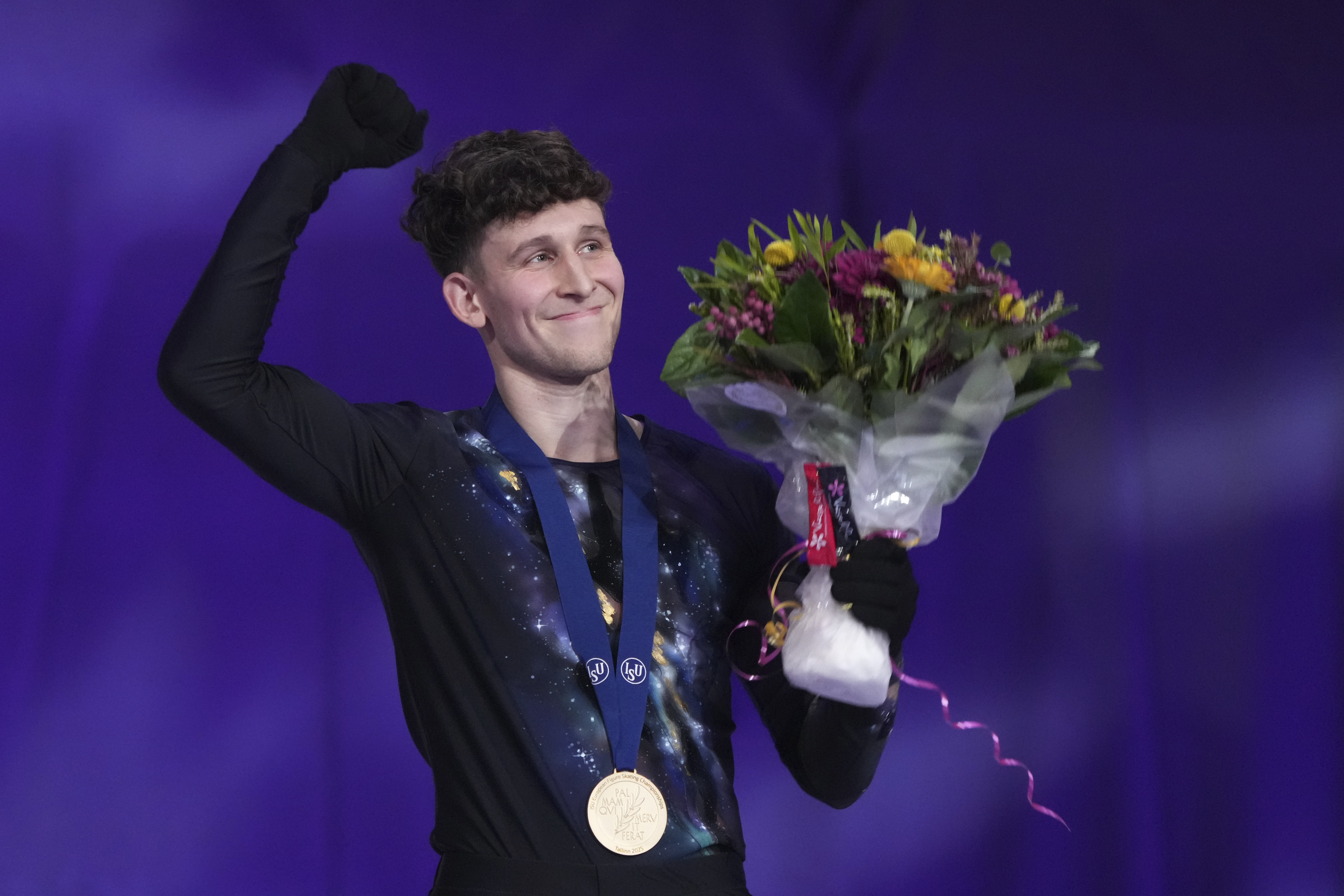 Gold medalist Lukas Britschgi of Switzerland poses with his medal during the victory ceremony for the men's free skating competition at the ISU European Figure Skating Championships in Tallinn, Estonia, Saturday, Feb. 1, 2025.