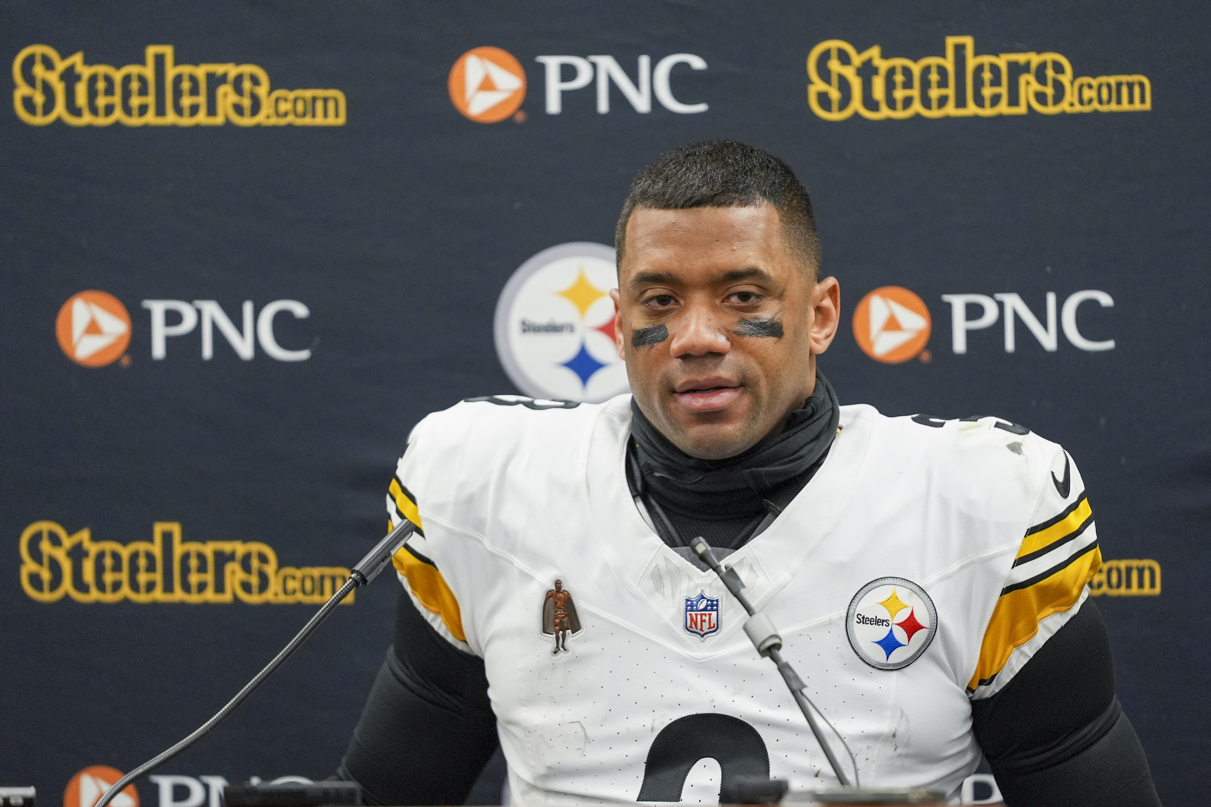 Pittsburgh Steelers quarterback Russell Wilson talks to reporters following an NFL wild-card playoff football game against the Baltimore Ravens, Saturday, Jan. 11, 2025, in Baltimore. The Ravens won 28-14. 