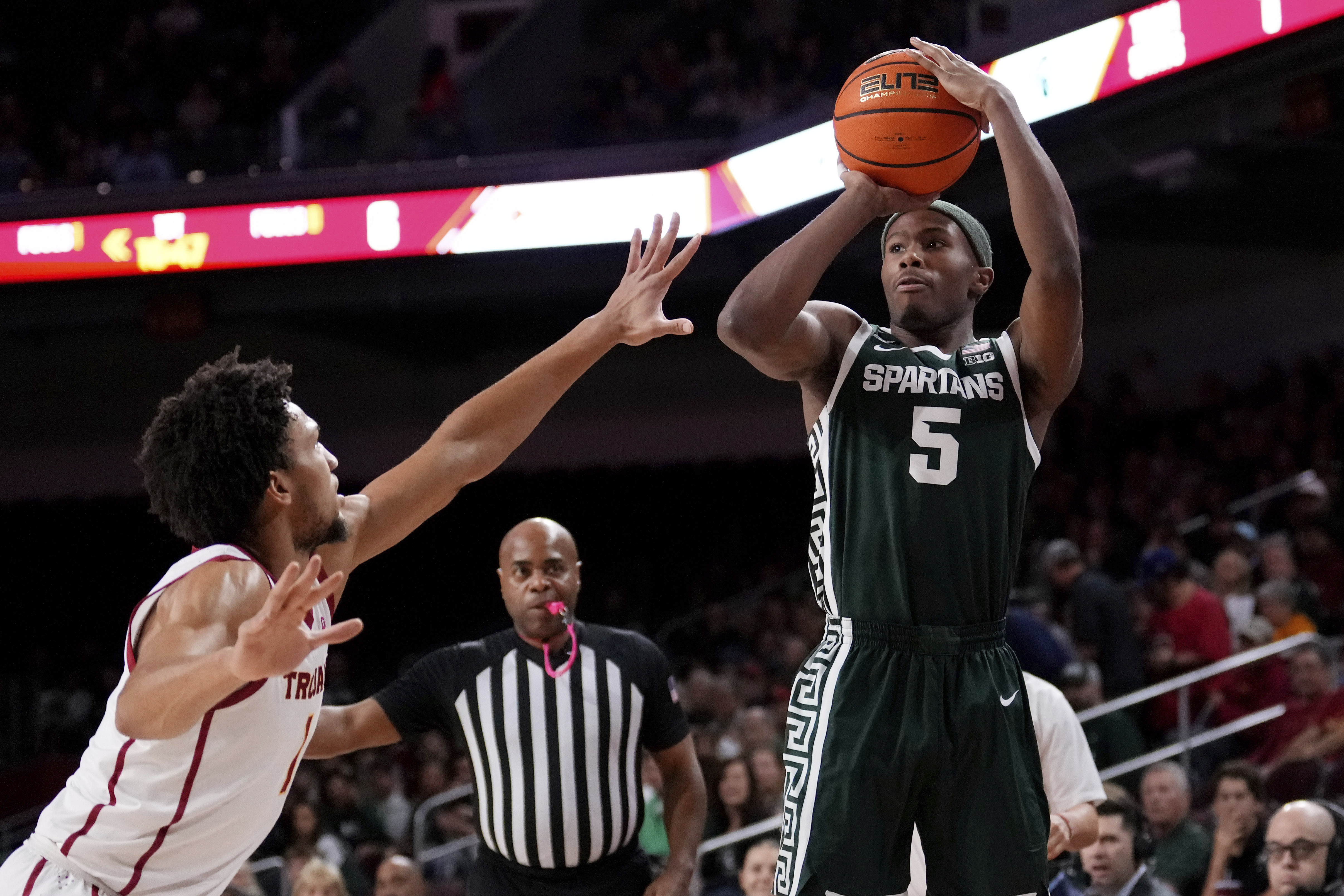 Claude, Yates III lead USC to 70-64 upset of No. 7 Michigan State and snap Spartans' 13-game streak