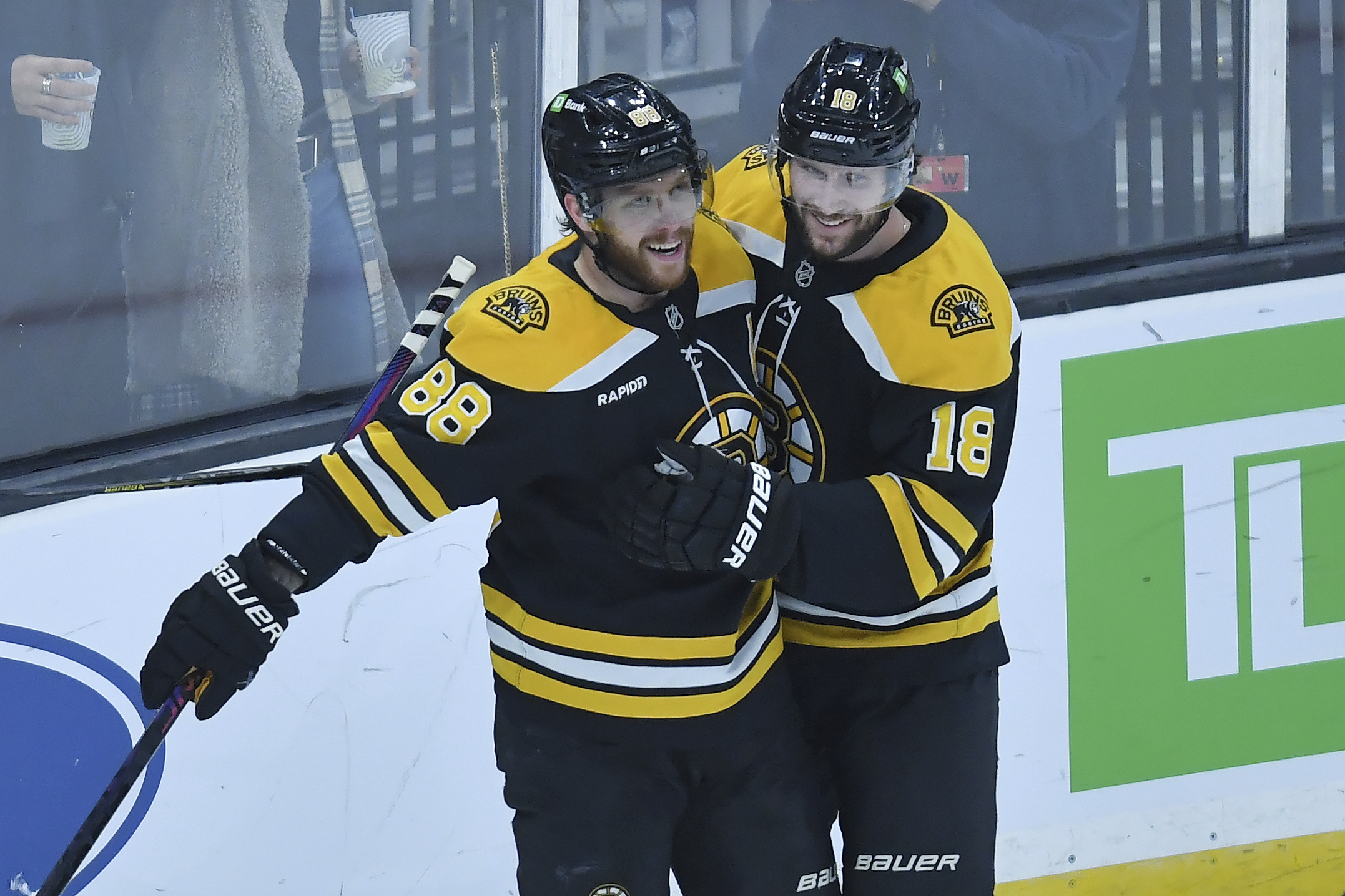 Boston Bruins right wing David Pastrnak (88) celebrates his goal with center Pavel Zacha (18) in the second period of an NHL hockey game against the San Jose Sharks, Monday, Jan. 20, 2025, in Boston. 