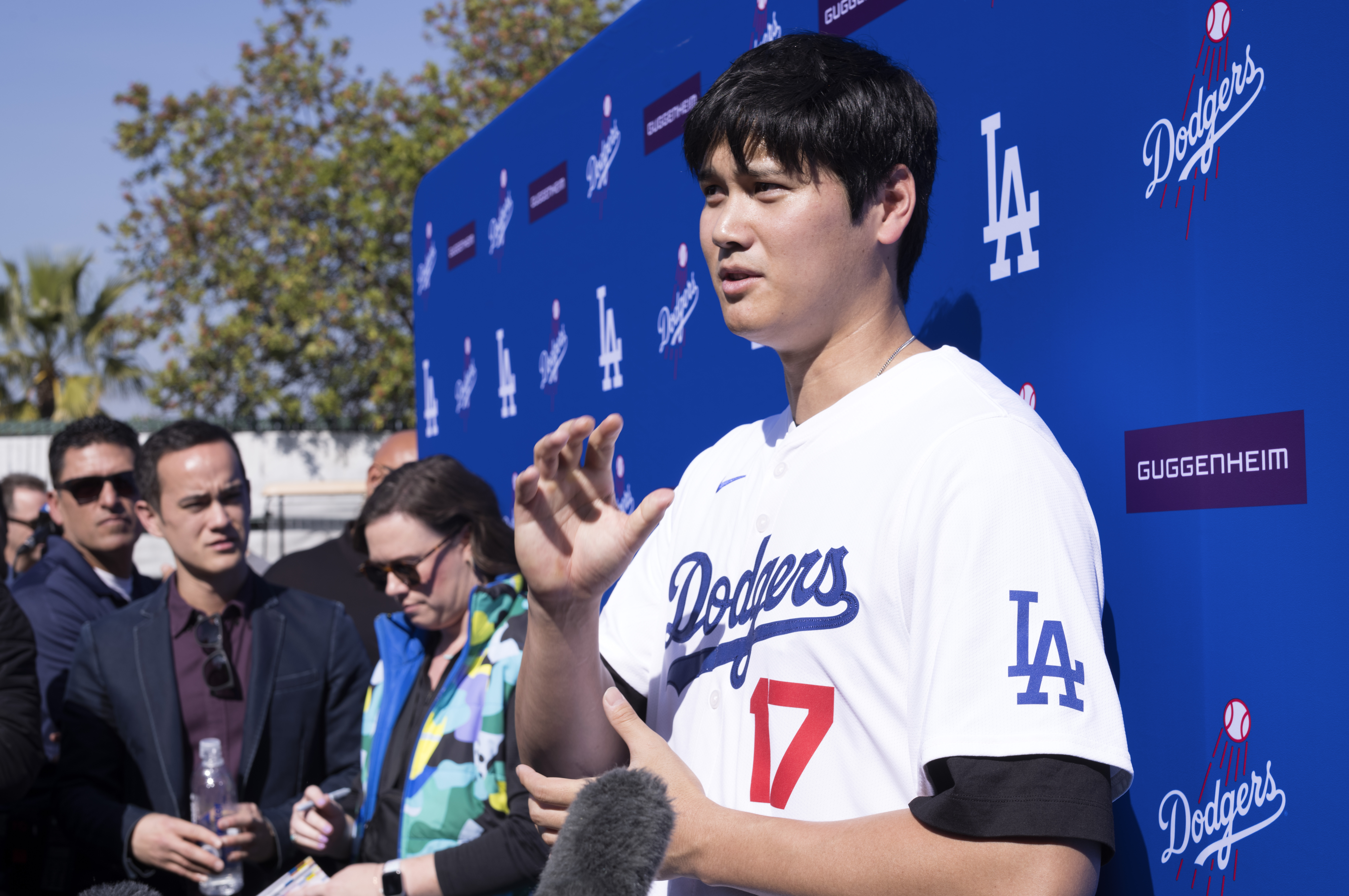 Los Angeles Dodgers' Shohei Ohtani talks to the media during a baseball interview during DodgerFest at Dodger Stadium, Saturday, Feb. 1, 2025, in Los Angeles. 