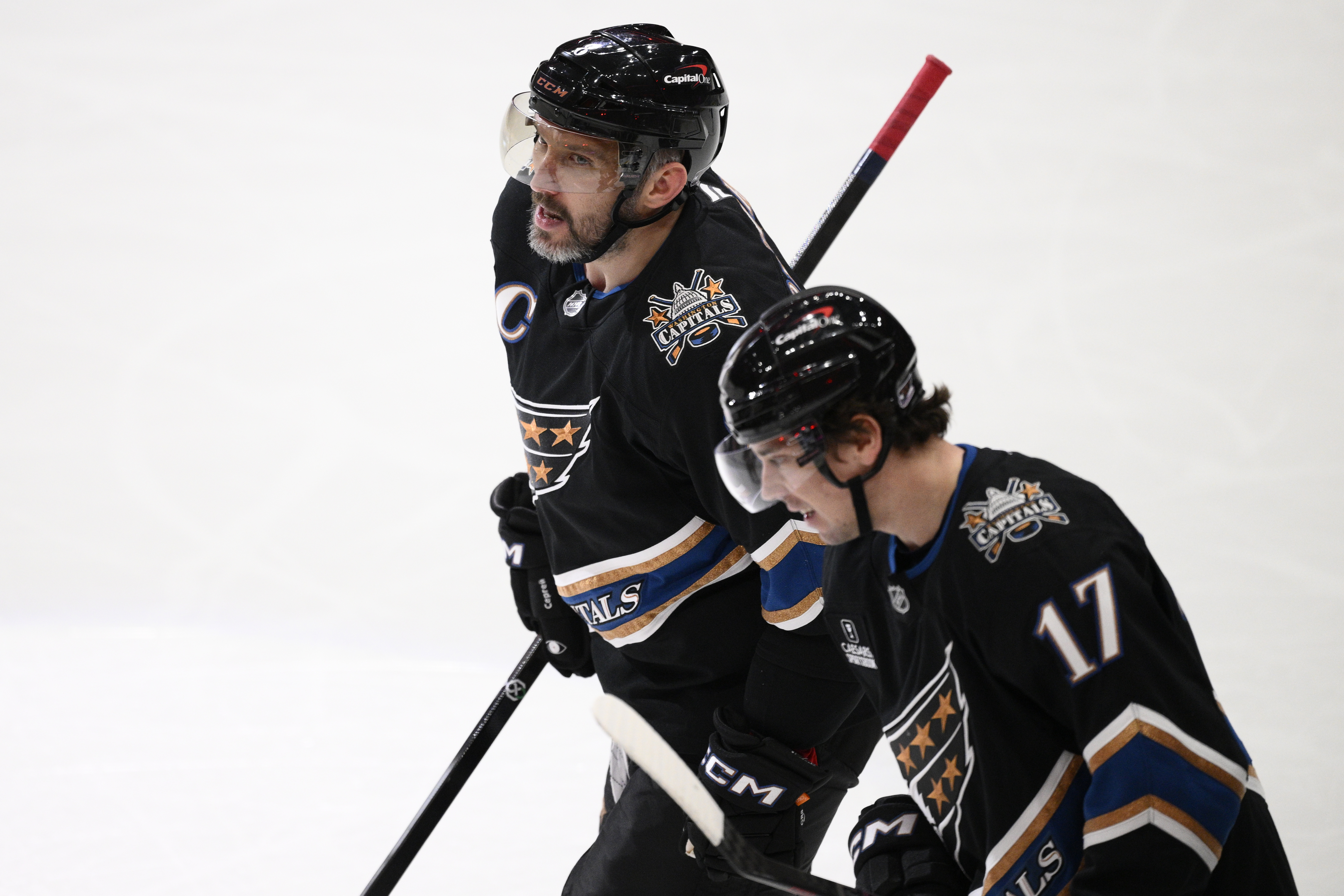 Washington Capitals left wing Alex Ovechkin (8) reacts after his goal next to center Dylan Strome (17) during the third period of an NHL hockey game against the Winnipeg Jets, Saturday, Feb. 1, 2025, in Washington.