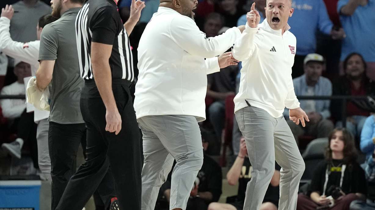 Texas Tech head coach Grant McCasland, right, reacts after being ejected by officials during the first half of an NCAA college basketball game against Houston in Houston, Saturday, Feb. 1, 2025.