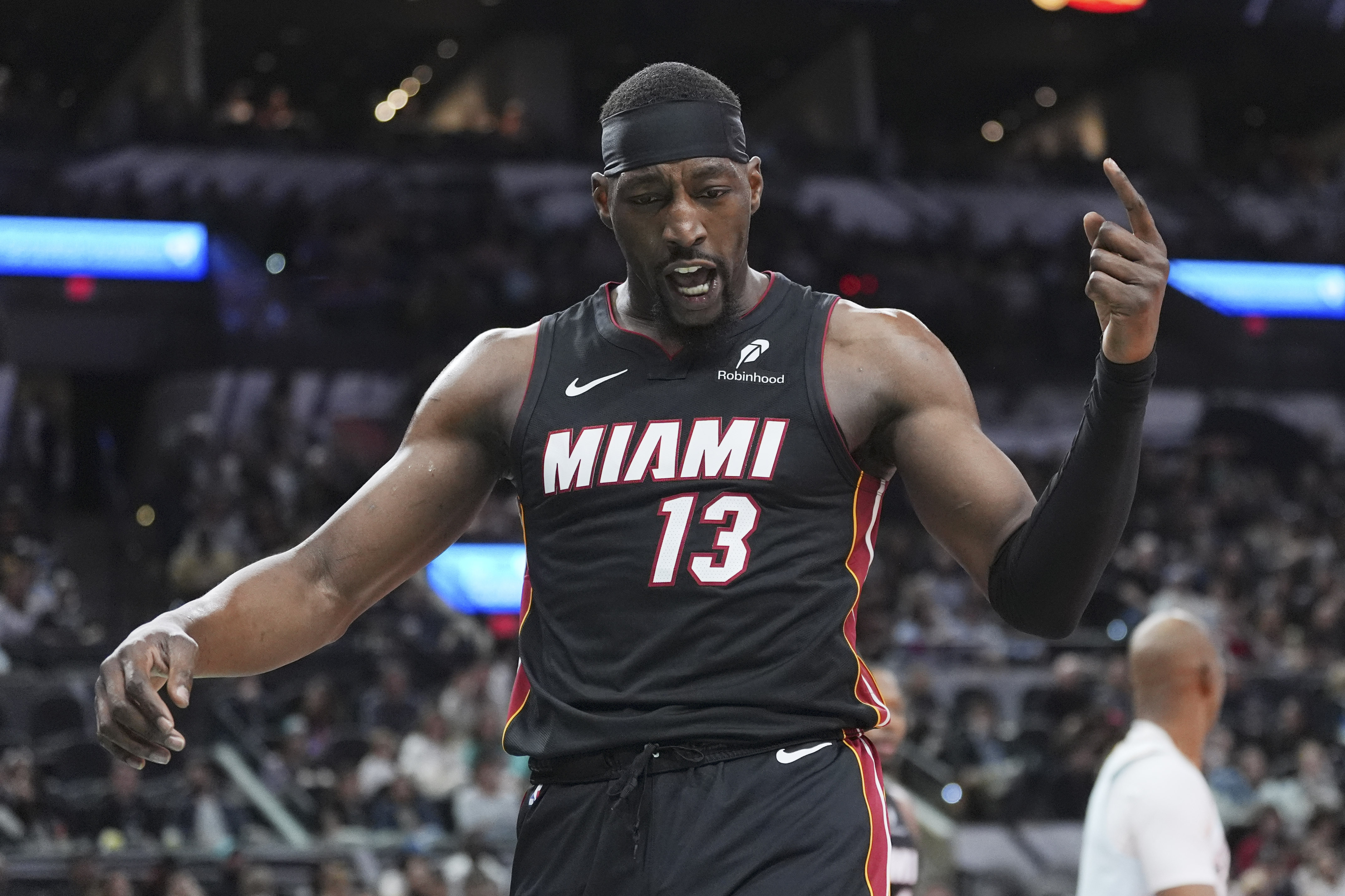 Miami Heat center Bam Adebayo (13) reacts to a play during the first half of an NBA basketball game against the San Antonio Spurs in San Antonio, Saturday, Feb. 1, 2025.