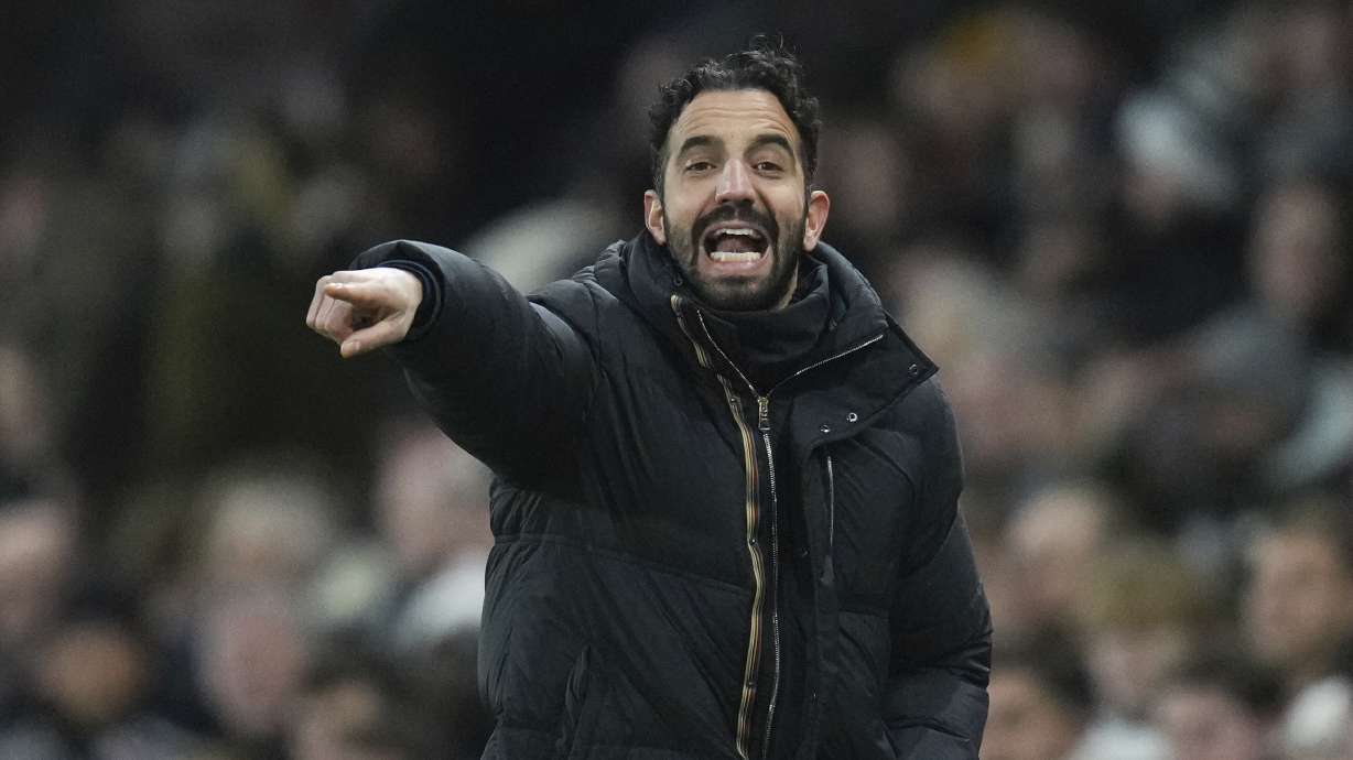 Manchester United's head coach Ruben Amorim gives instructions during the English Premier League soccer match between Fulham and Manchester United at Craven Cottage stadium in London, Sunday, Jan. 26, 2025.