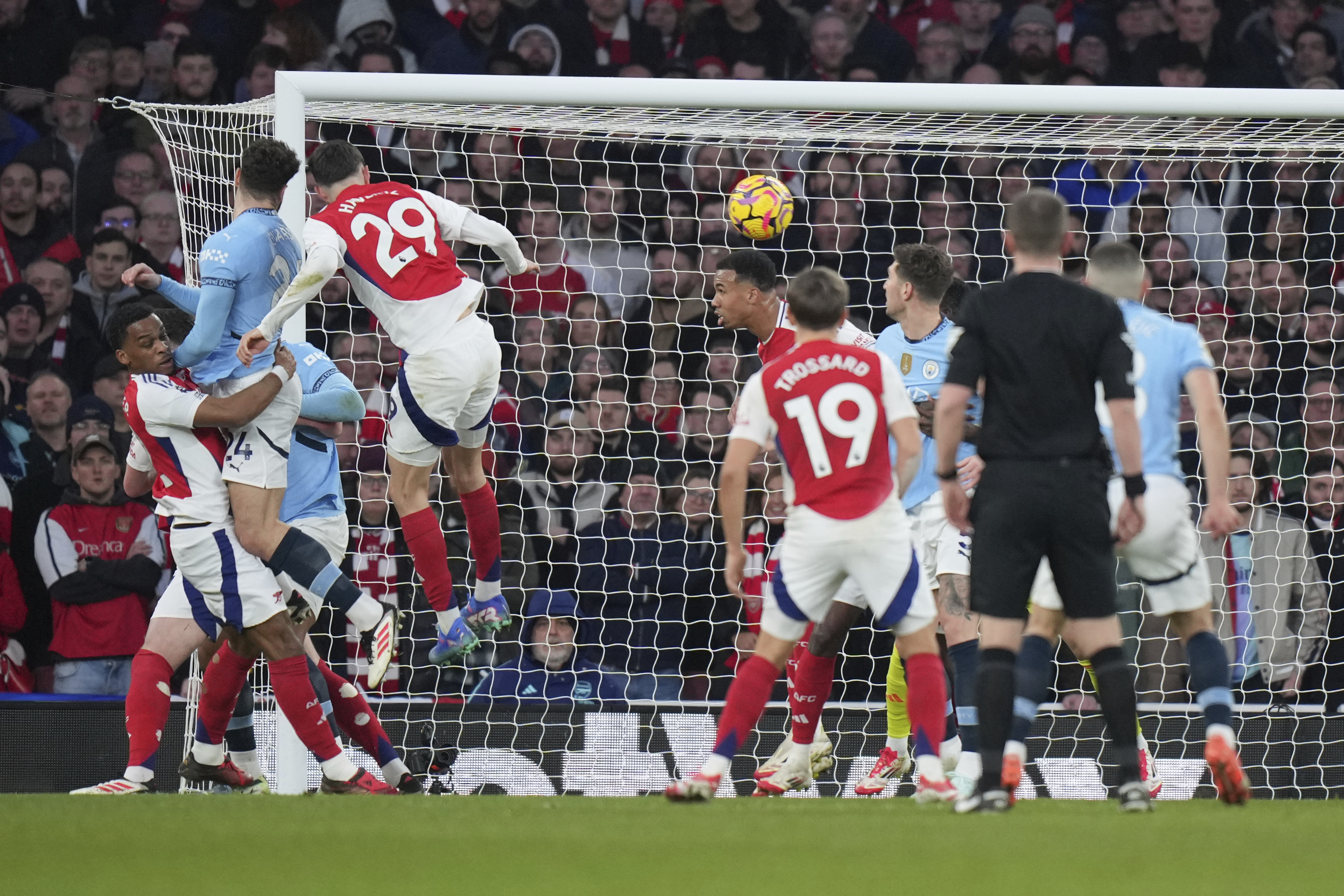 Manchester City's Josko Gvardiol, second from left, fails a chance to score during the English Premier League soccer match between Arsenal and Manchester City at the Emirates stadium in London, Sunday, Feb. 2, 2025.