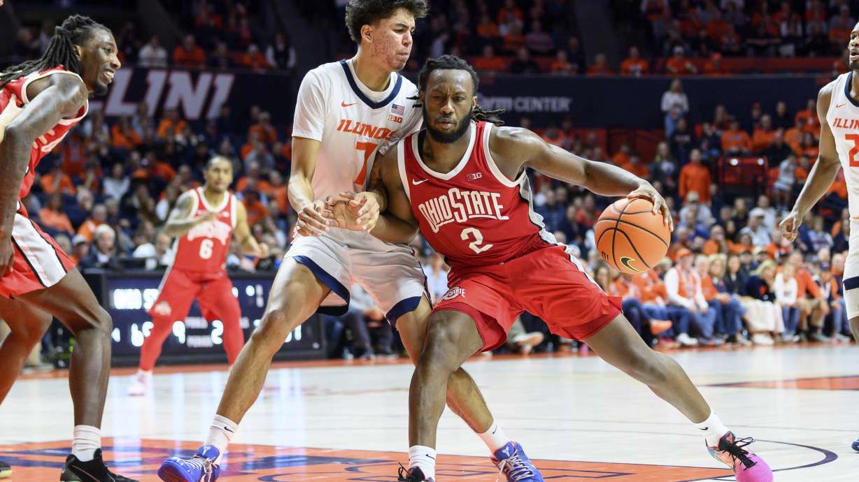 Ohio State's Bruce Thornton (2) drives for position against Illinois' Will Riley, center left, during the second half of an NCAA college basketball game Sunday, Feb. 2, 2025, in Champaign, Ill.