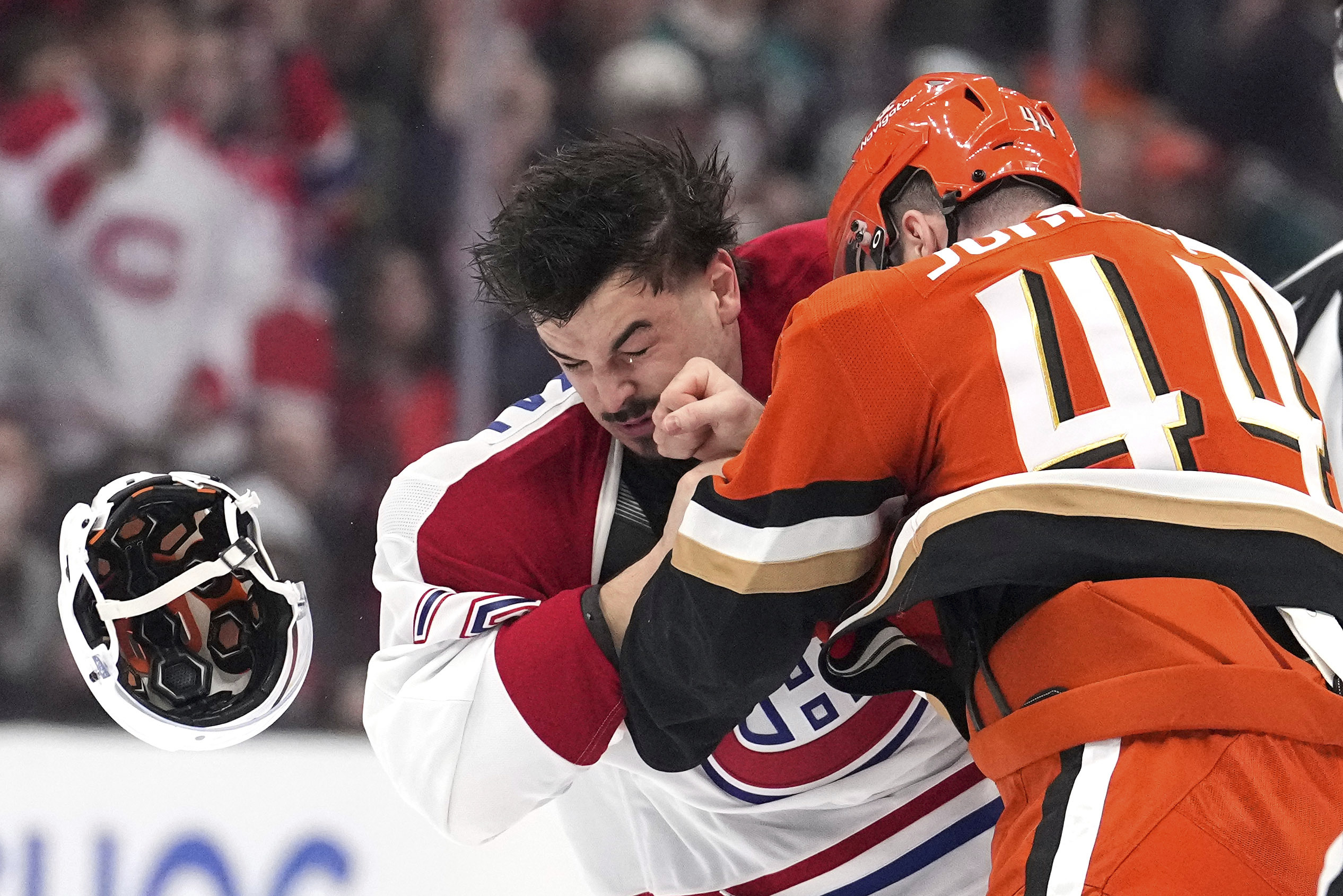 Montreal Canadiens defenseman Arber Xhekaj, left, and Anaheim Ducks left wing Ross Johnston fight during the first period of an NHL hockey game, Sunday, Feb. 2, 2025, in Anaheim, Calif. 