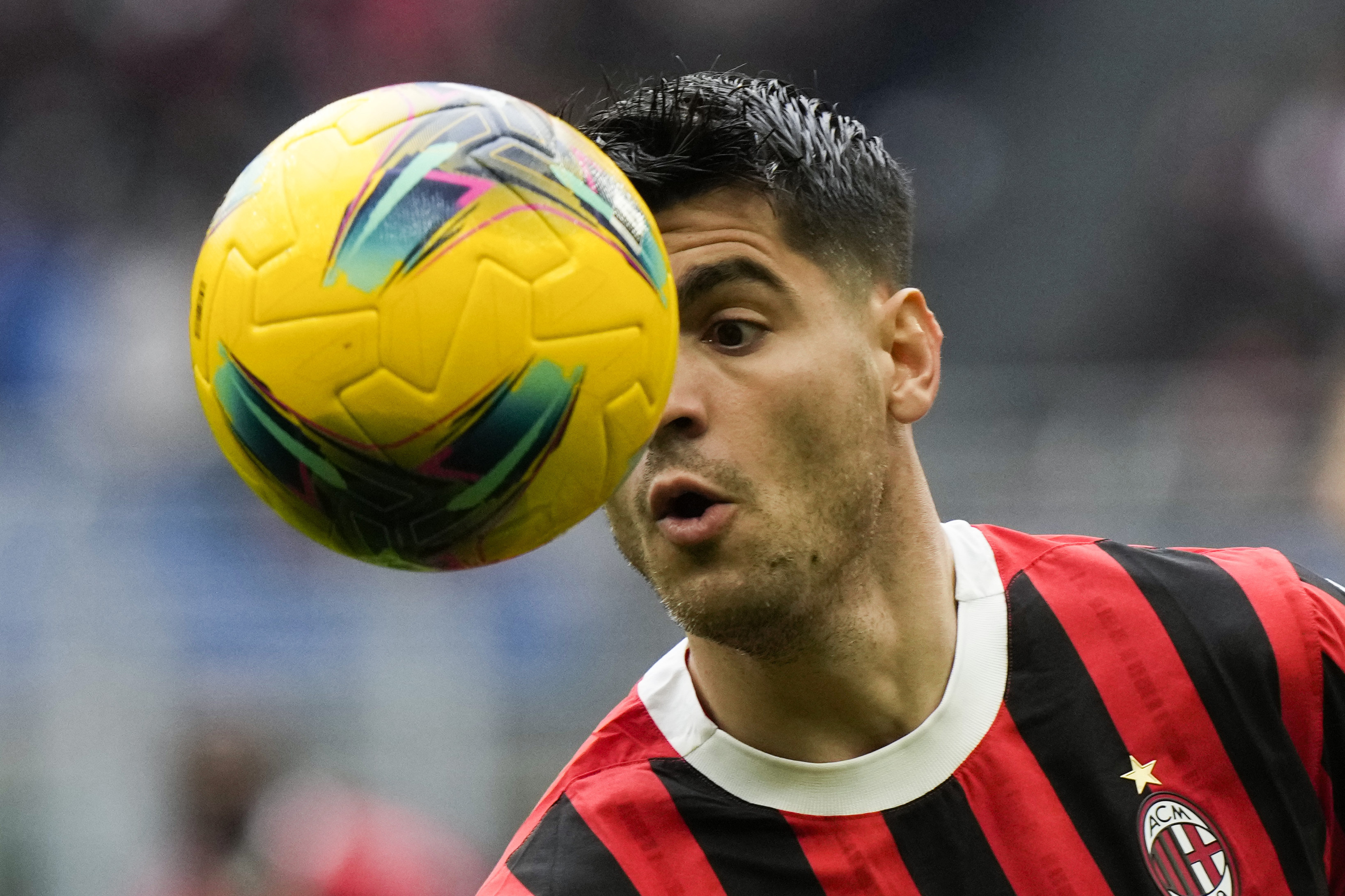 AC Milan's Alvaro Morata makes an attempt to score during a Serie A soccer match between AC Milan and Parma, at the San Siro stadium in Milan, Italy, Sunday, Jan. 26, 2025. 