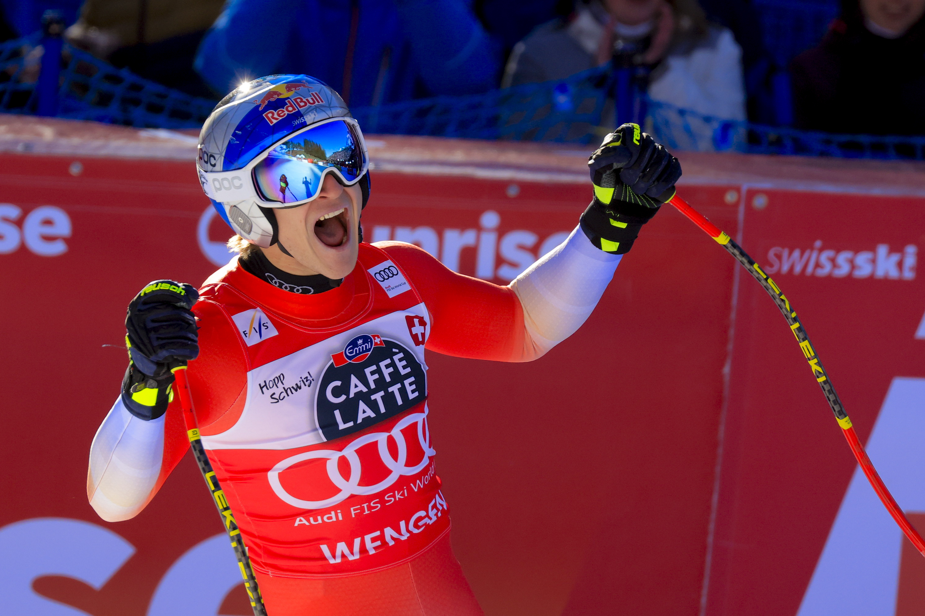 Switzerland's Marco Odermatt celebrates at the finish area of an alpine ski, men's World Cup downhill, in Wengen, Switzerland, Saturday, Jan. 18, 2025 