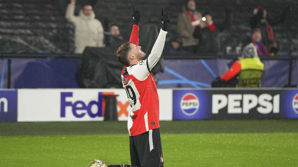 Feyenoord's Santiago Gimenez celebrates after scoring his side's second goal during the Champions League opening phase soccer match between Feyenoord and Bayern Munich, at De Kuip Stadium, in Rotterdam, Netherlands, Wednesday, Jan. 22, 2025.