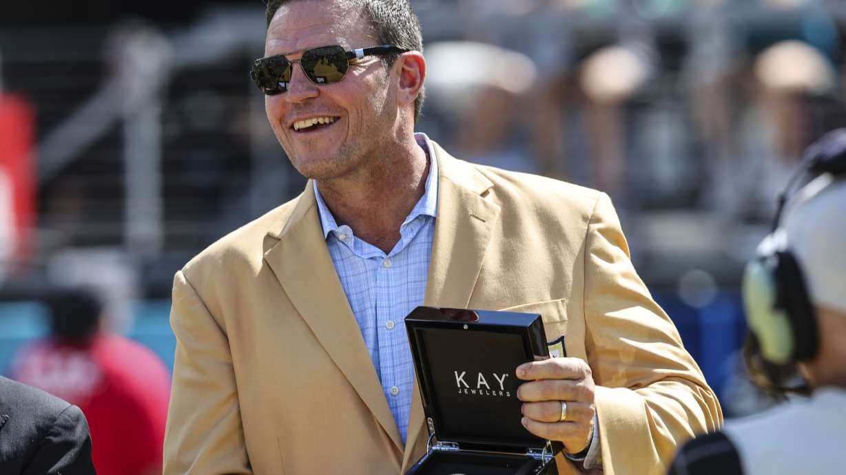 FILE - Tony Boselli receives his Pro Football Hall of Fame ring during halftime of an NFL football game between the Jacksonville Jaguars and the Houston Texans on Sunday, Oct. 9, 2022, in Jacksonville, Fla.