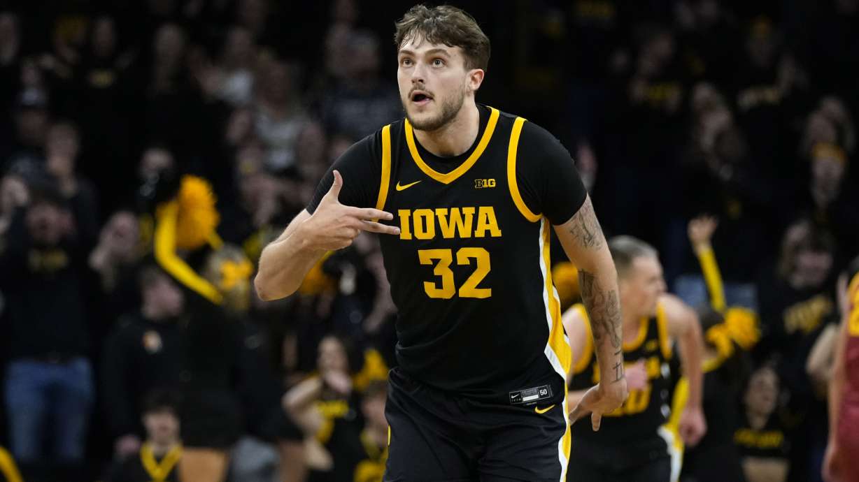 FILE - Iowa forward Owen Freeman celebrates after making a three-point basket during the first half of an NCAA college basketball game against Iowa State, Thursday, Dec. 12, 2024, in Iowa City, Iowa.