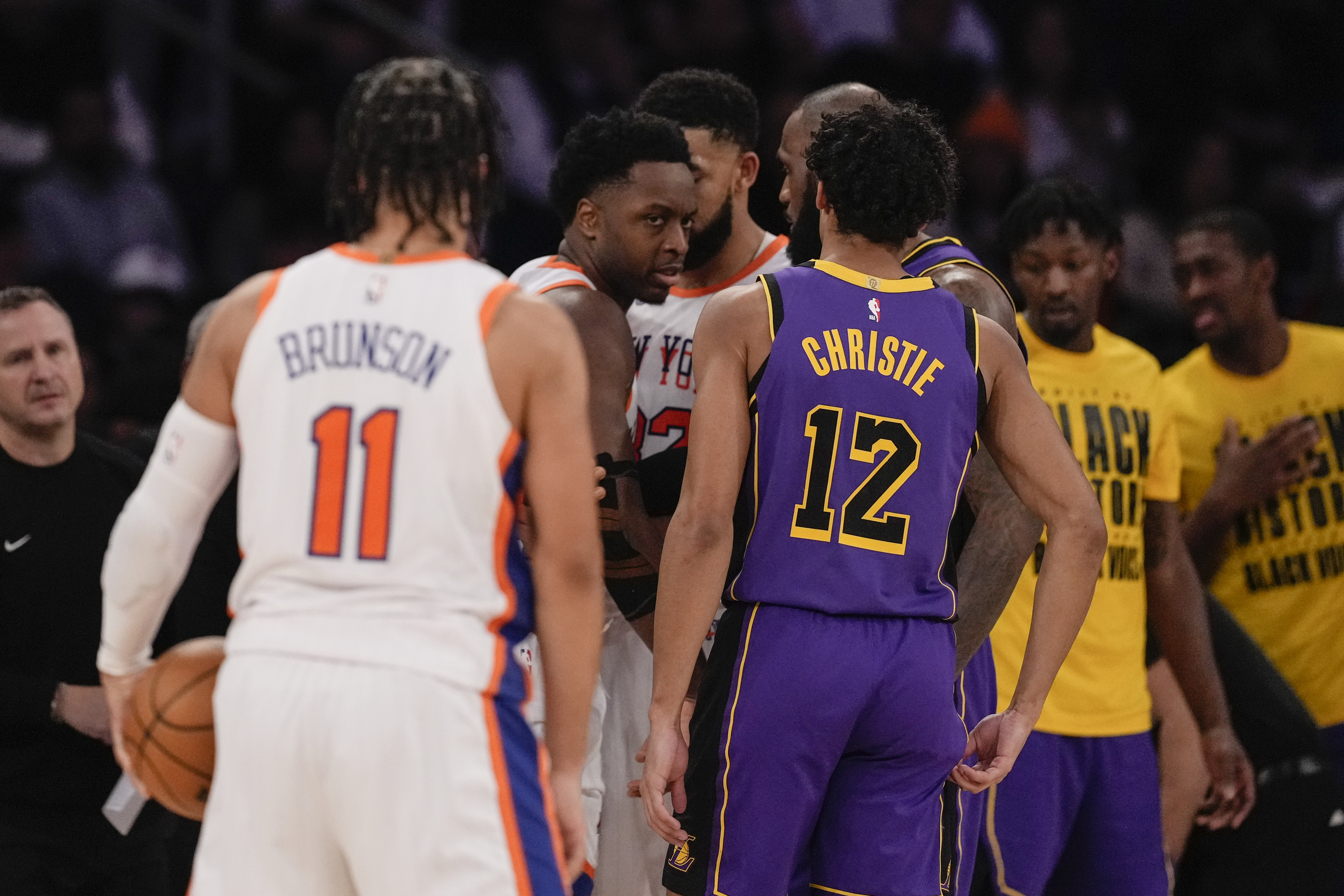 New York Knicks' OG Anunoby, center, reacts after getting injured during the second half of an NBA basketball game against the Los Angeles Lakers Saturday, Feb. 1, 2025, in New York. 
