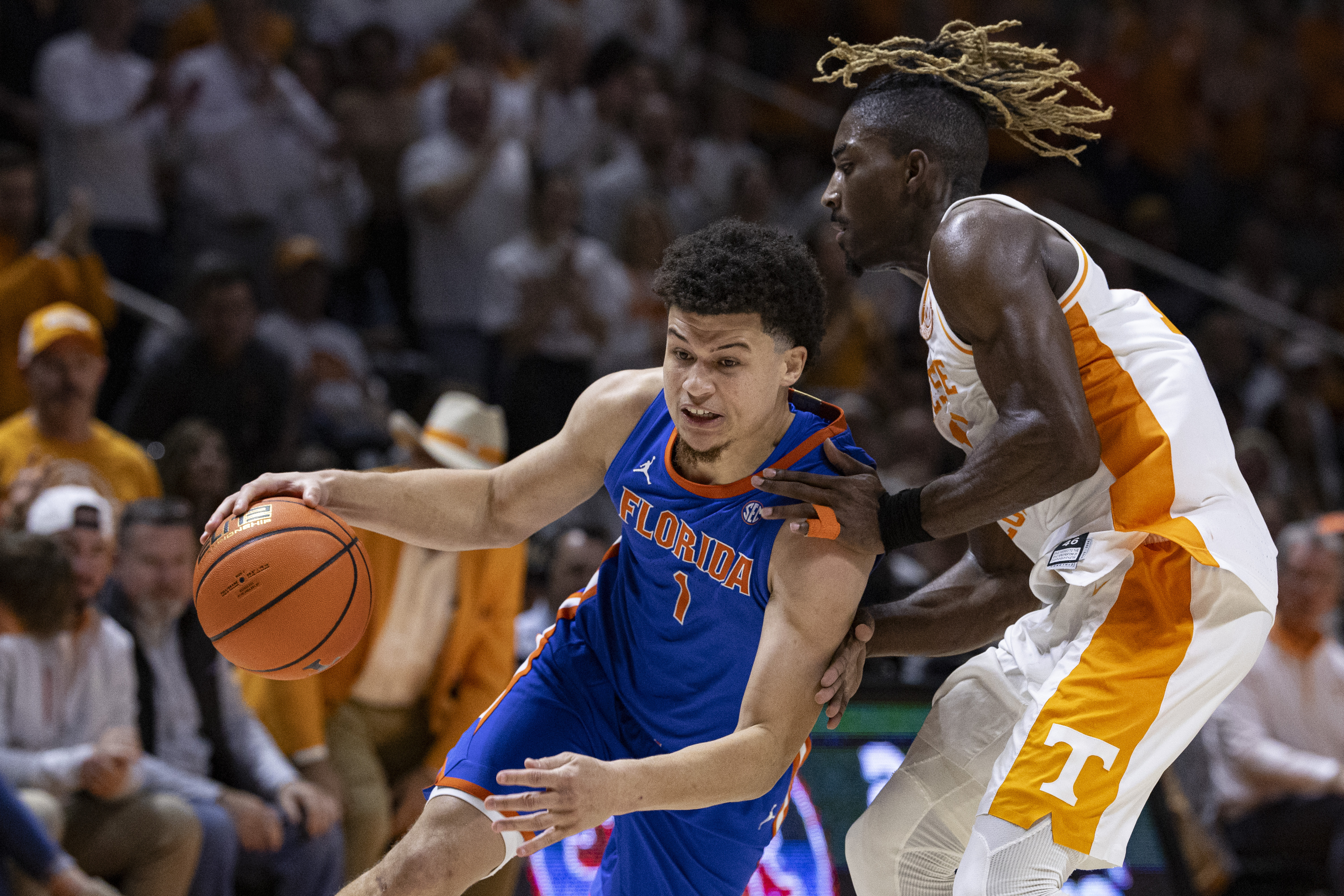 Florida guard Walter Clayton Jr. (1) drives against Tennessee guard Jahmai Mashack (15) during the second half of an NCAA college basketball game Saturday, Feb. 1, 2025, in Knoxville, Tenn. 