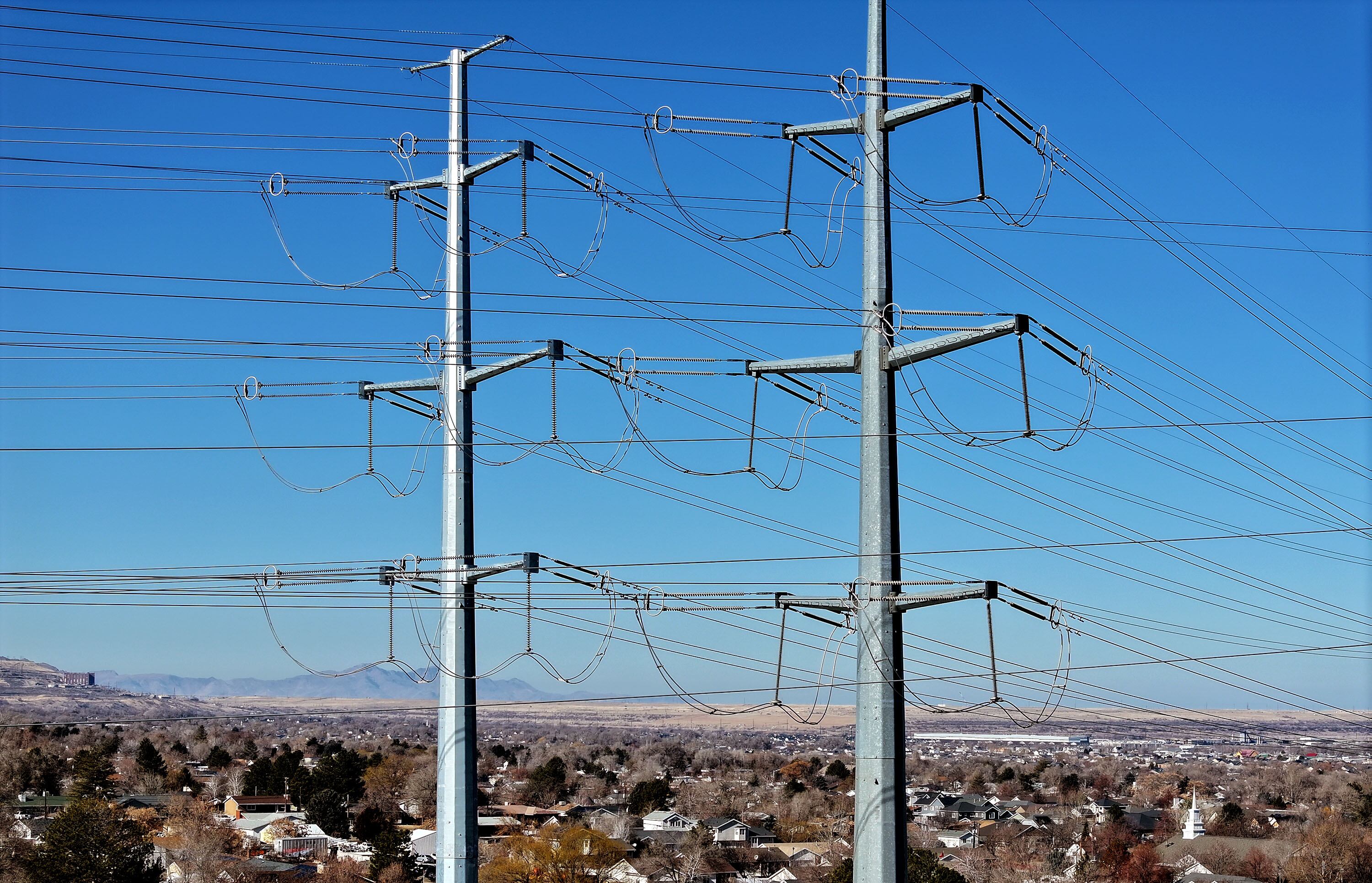 Power lines are pictured in West Valley City on Jan. 29. Two energy bills sponsored by Rep. Derrin Owens advanced unanimously from a Senate committee late last week.