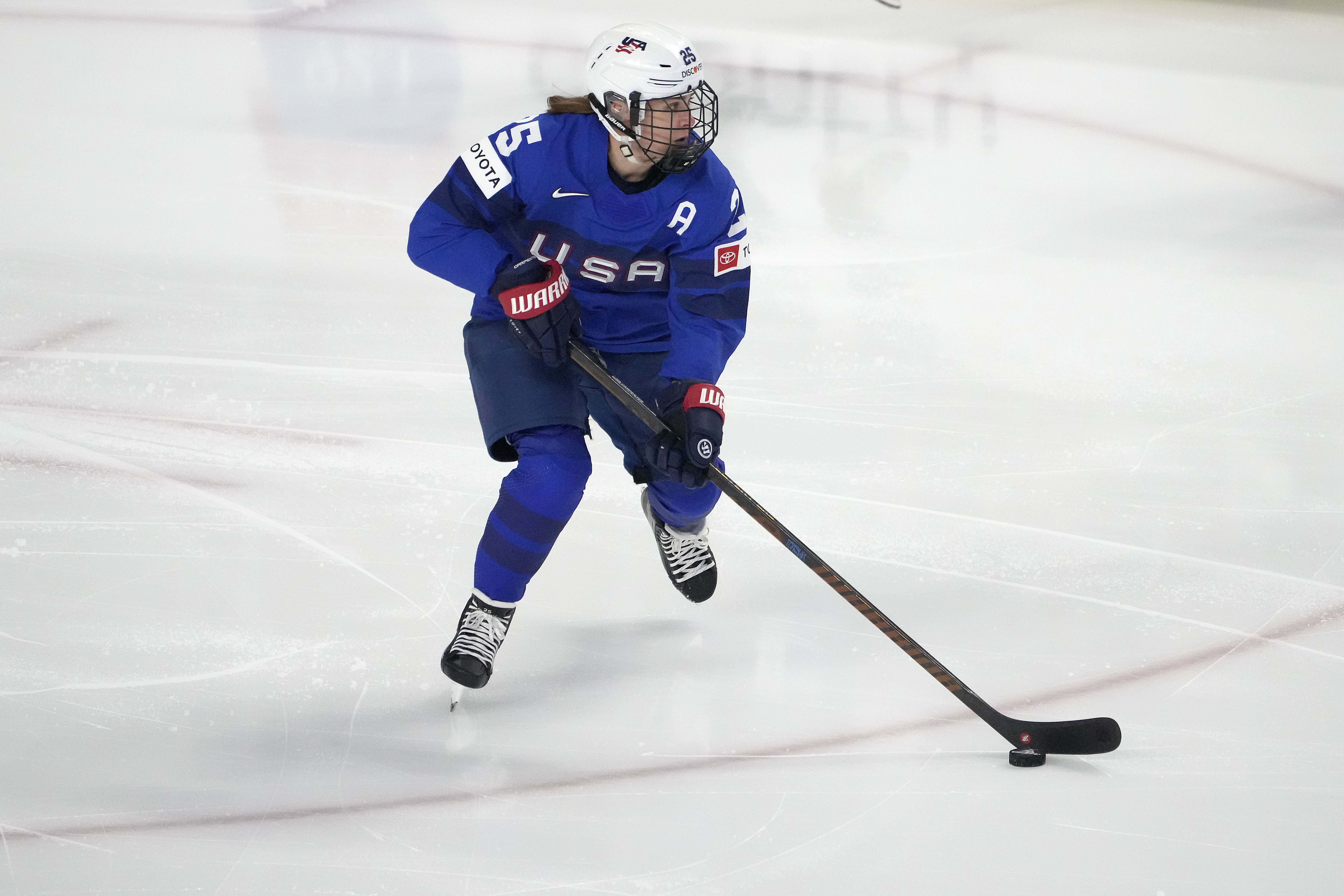 FILE - United States forward Alex Carpenter (25) skates against Canada during the first period of a women's Rivalry Series hockey game in San Jose, Calif., Nov. 6, 2024. 