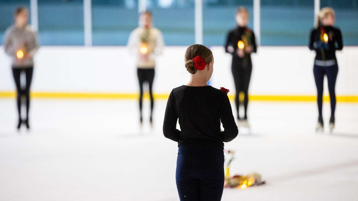 The Cottonwood Heights Figure Skating Club, in unity with skating clubs nationwide and U.S. Figure Skating, holds a memorial vigil in honor of the lives lost in Flight AA5342 at the Cottonwood Heights Recreation Center in Salt Lake City on Monday.