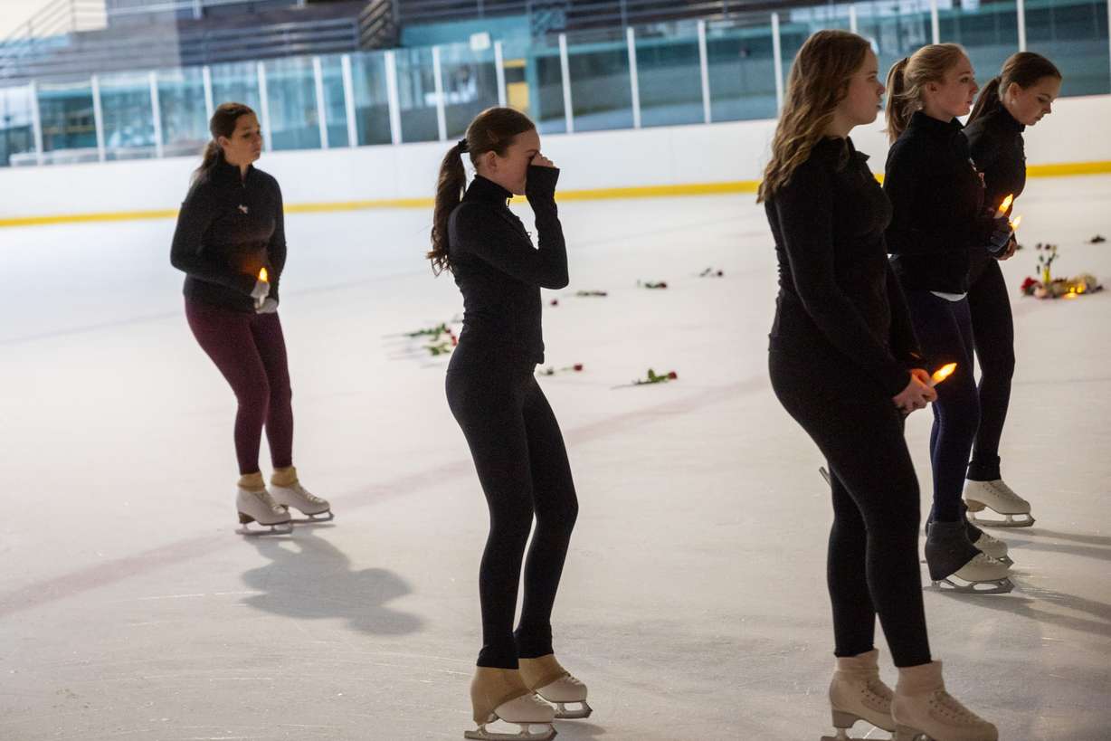 The Cottonwood Heights Figure Skating Club, in unity with skating clubs nationwide and U.S. Figure Skating, holds a Memorial Vigil in honor of the lives lost in Flight AA5342 at the Cottonwood Heights Recreation Center in Salt Lake City on Monday.
