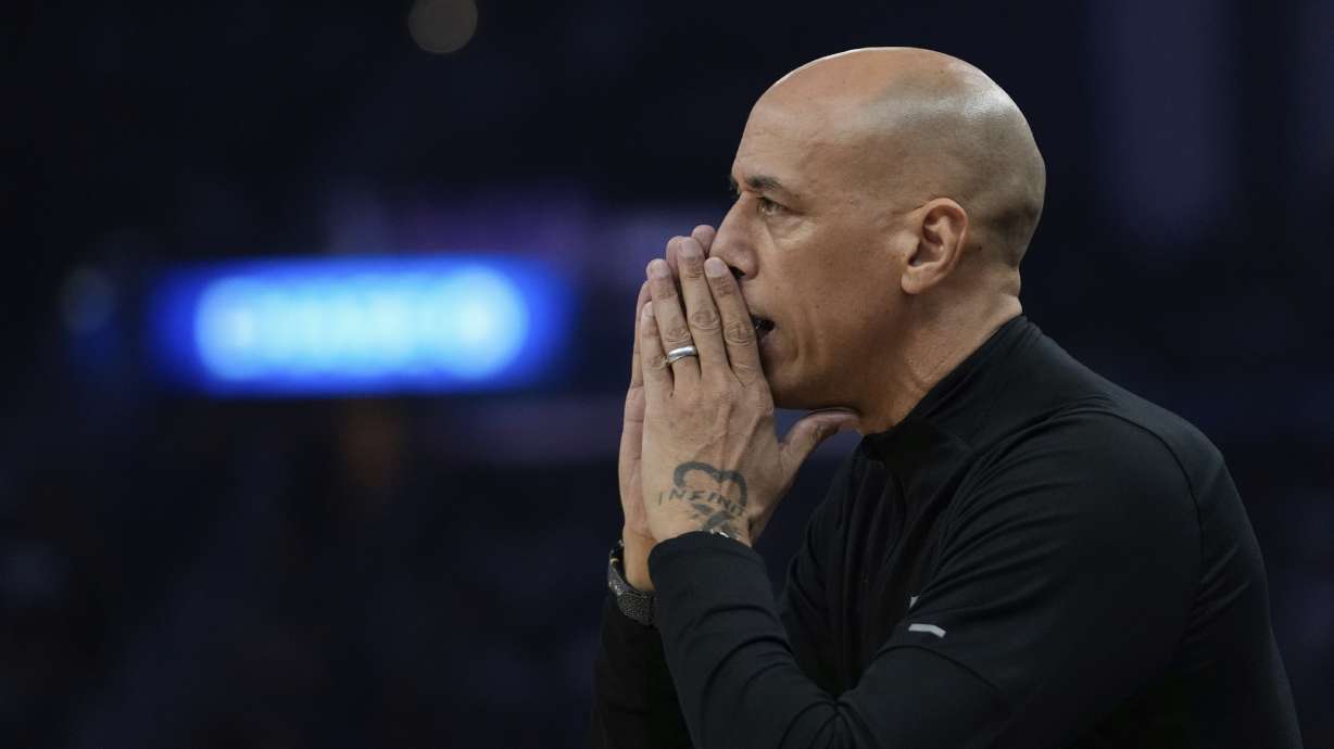 Sacramento Kings interim head coach Doug Christie gestures during the first half of an NBA basketball game against the Golden State Warriors, Sunday, Jan. 5, 2025, in San Francisco.