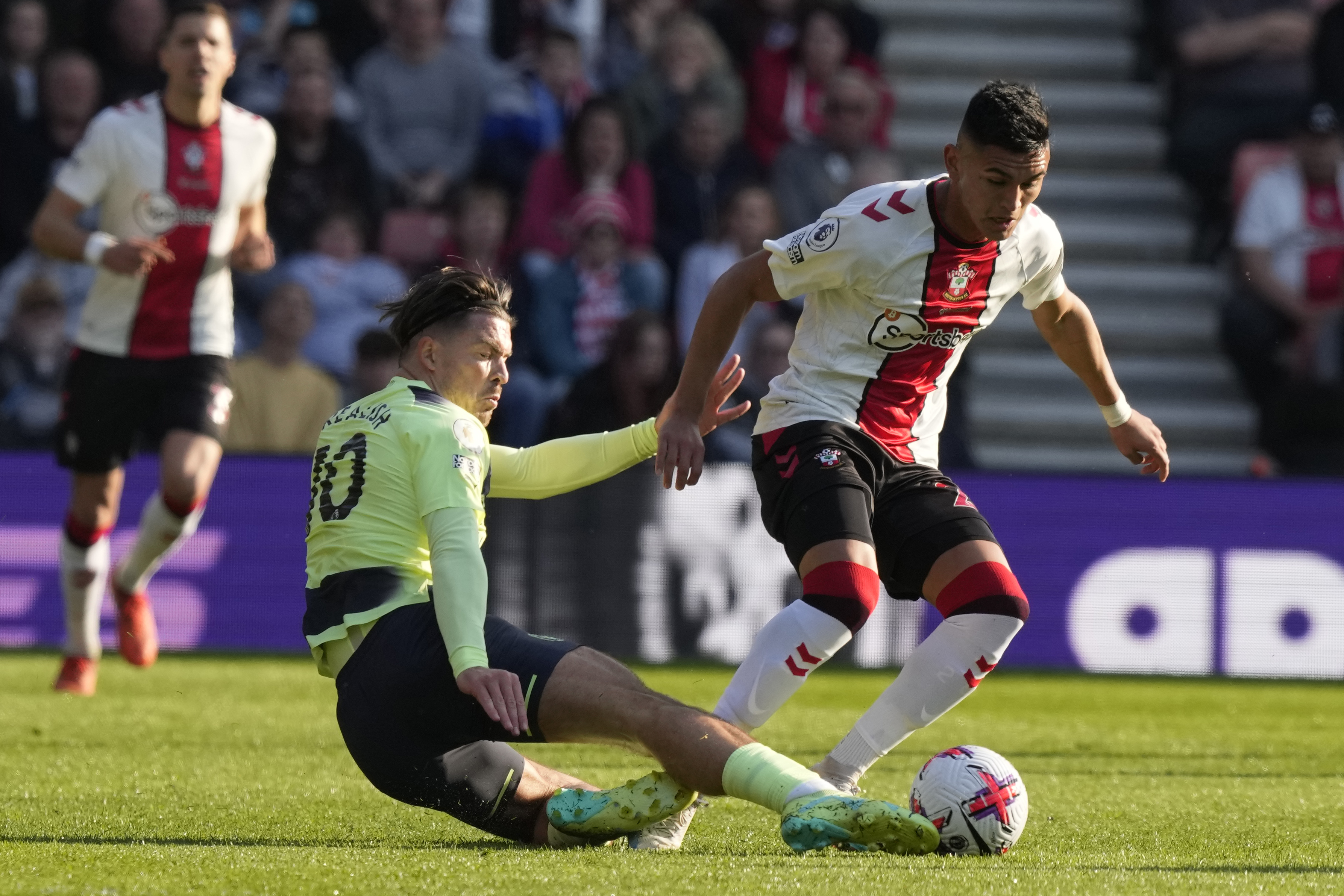 FILE - Southampton's Carlos Alcaraz, right, and Manchester City's Jack Grealish challenge for the ball during the English Premier League soccer match between Southampton and Manchester City at St Mary's Stadium in Southampton, England, on April 8, 2023. 