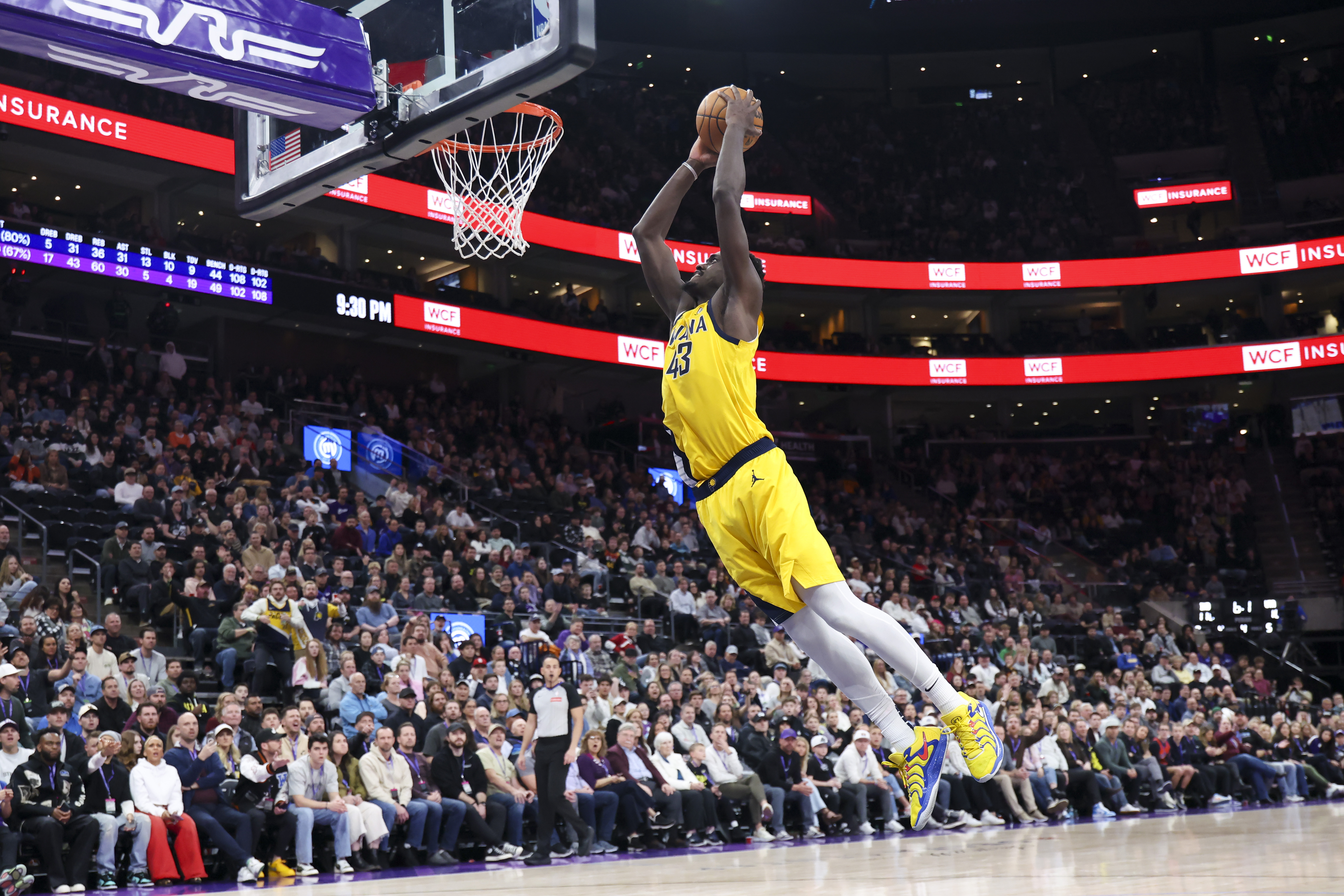 Indiana Pacers forward Pascal Siakam goes up to dunk against the Utah Jazz during the fourth quarter of an NBA basketball game, Monday, Feb. 3, 2025, in Salt Lake City. 