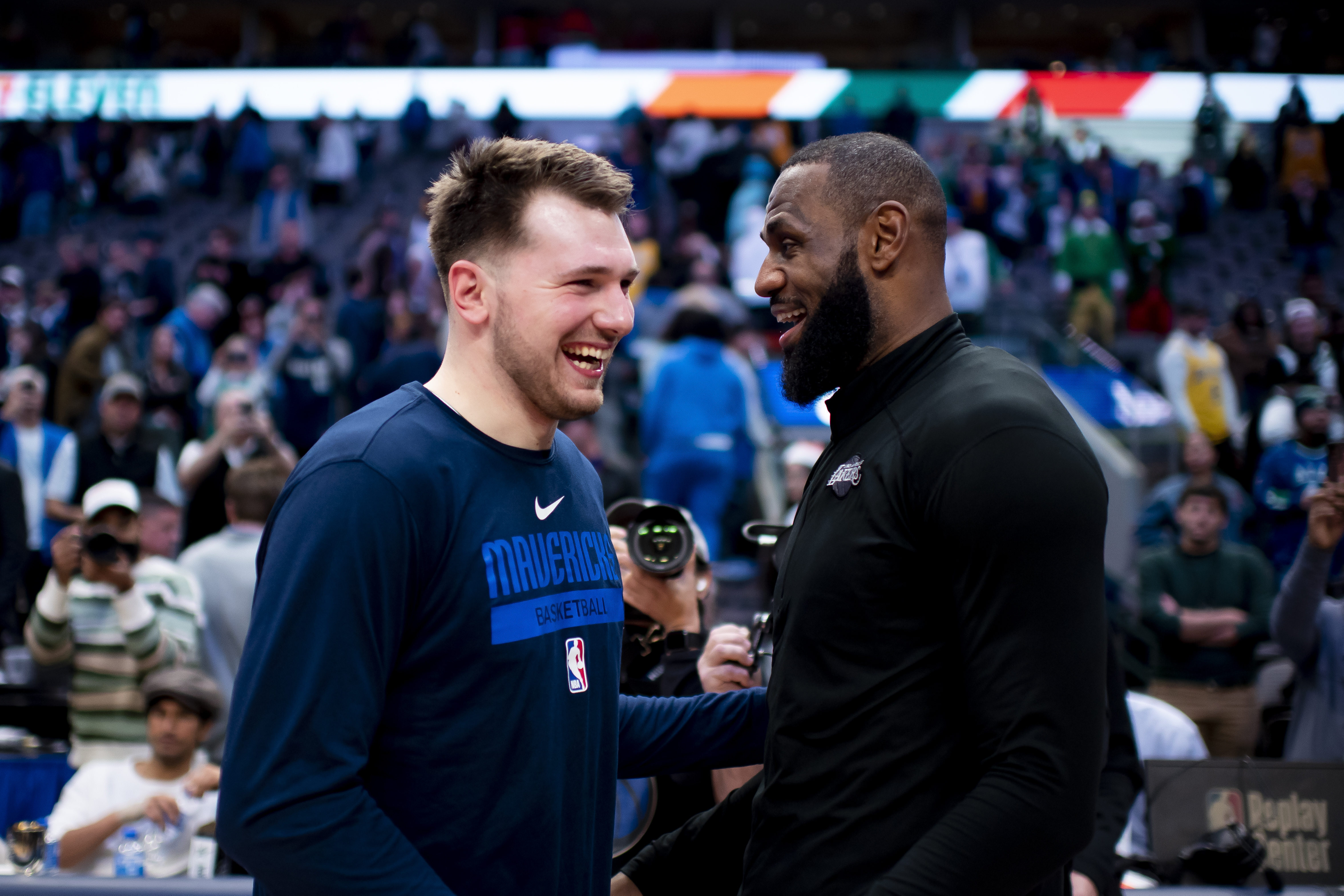 FILE - Dallas Mavericks guard Luka Doncic shares a laugh with Los Angeles Lakers forward LeBron James following an NBA basketball game in Dallas, Dec. 25, 2022. Dallas won the game by a final of 124-115. 