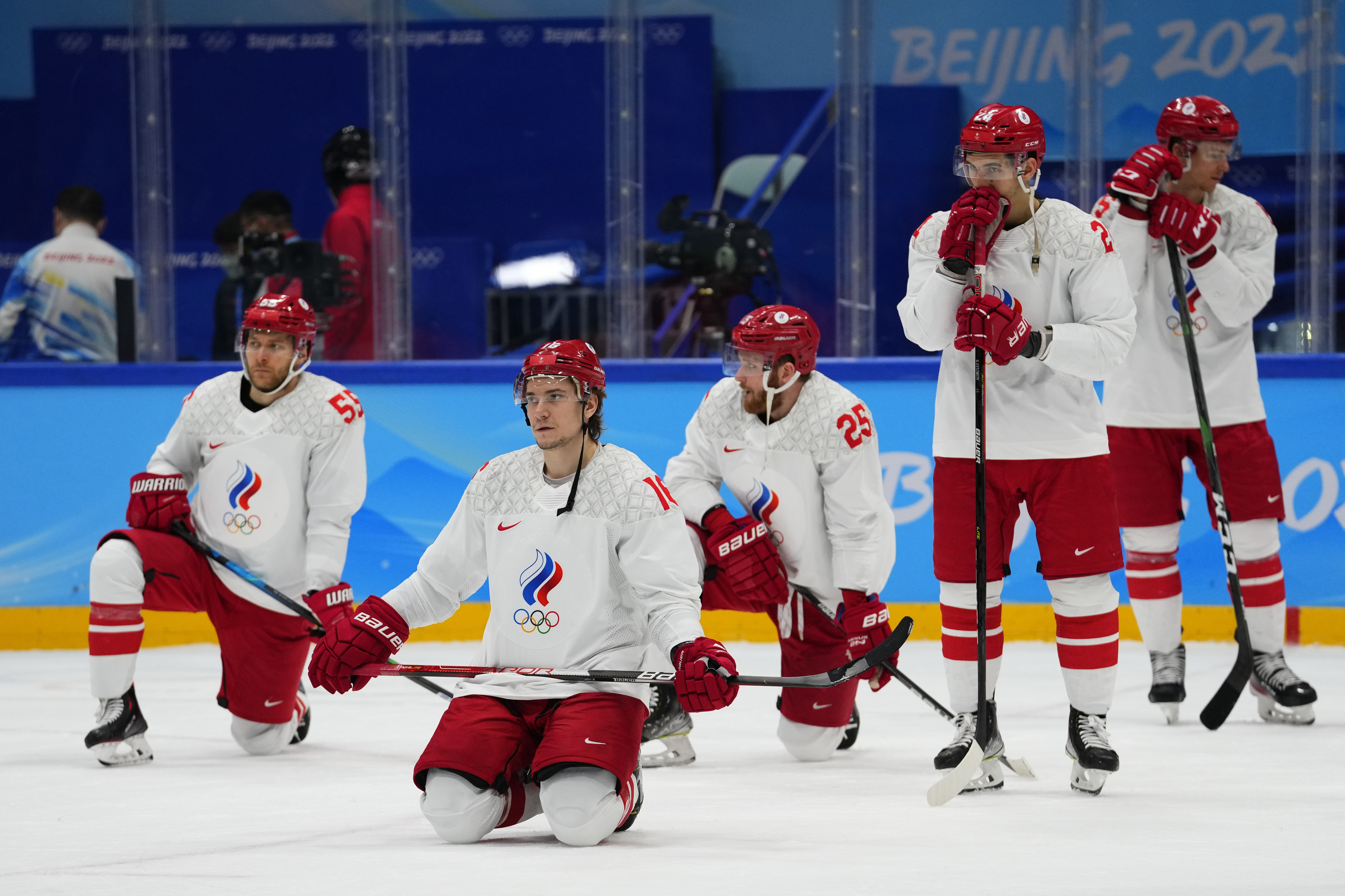 FILE - Russian Olympic Committee react after losing to Finland in the men's gold medal hockey game at the 2022 Winter Olympics, Sunday, Feb. 20, 2022, in Beijing.