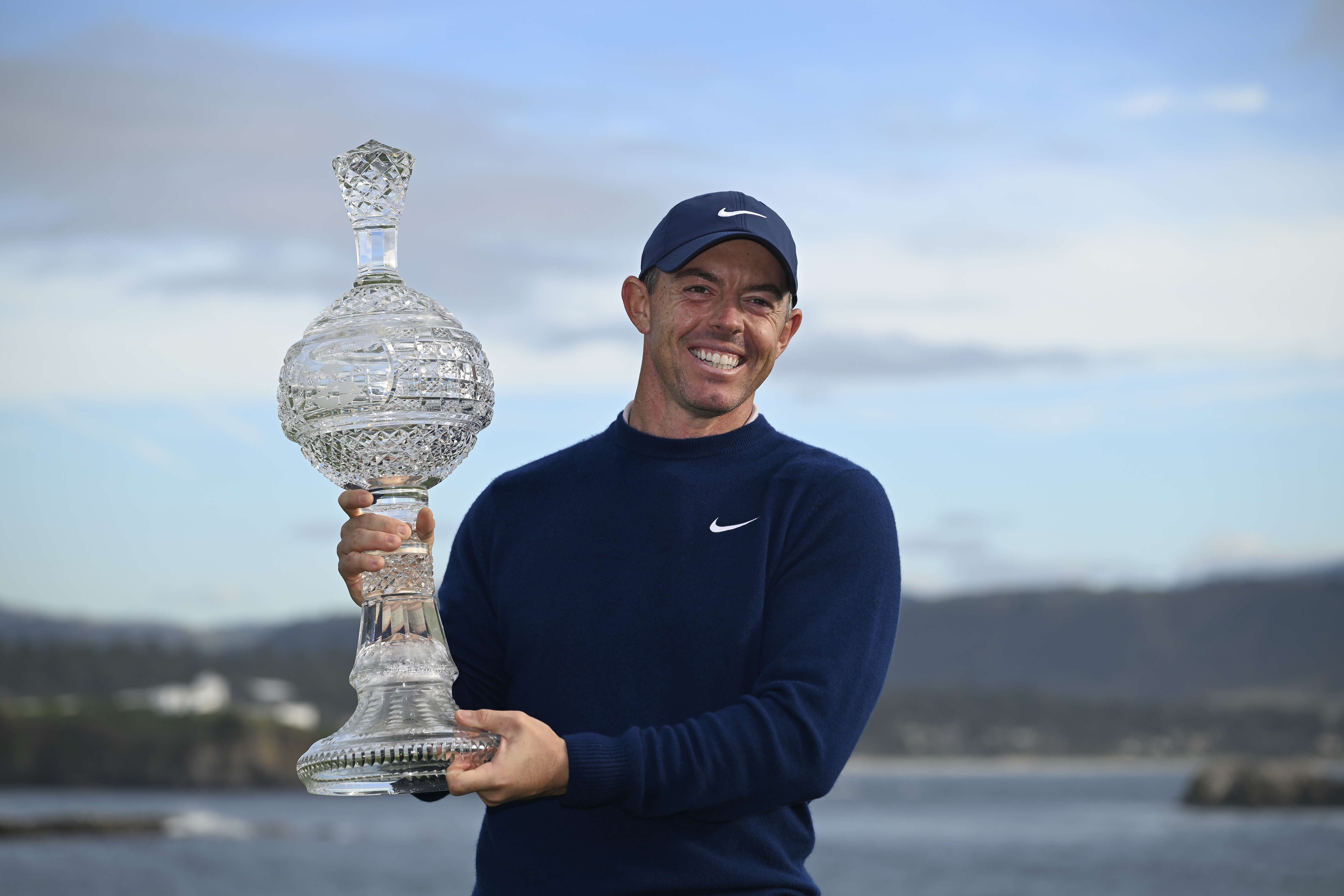 Rory McIlroy, of Northern Ireland, celebrates at Pebble Beach Golf Links after winning the AT&T Pebble Beach Pro-Am golf tournament, Sunday, Feb. 2, 2025, in Pebble Beach, Calif.