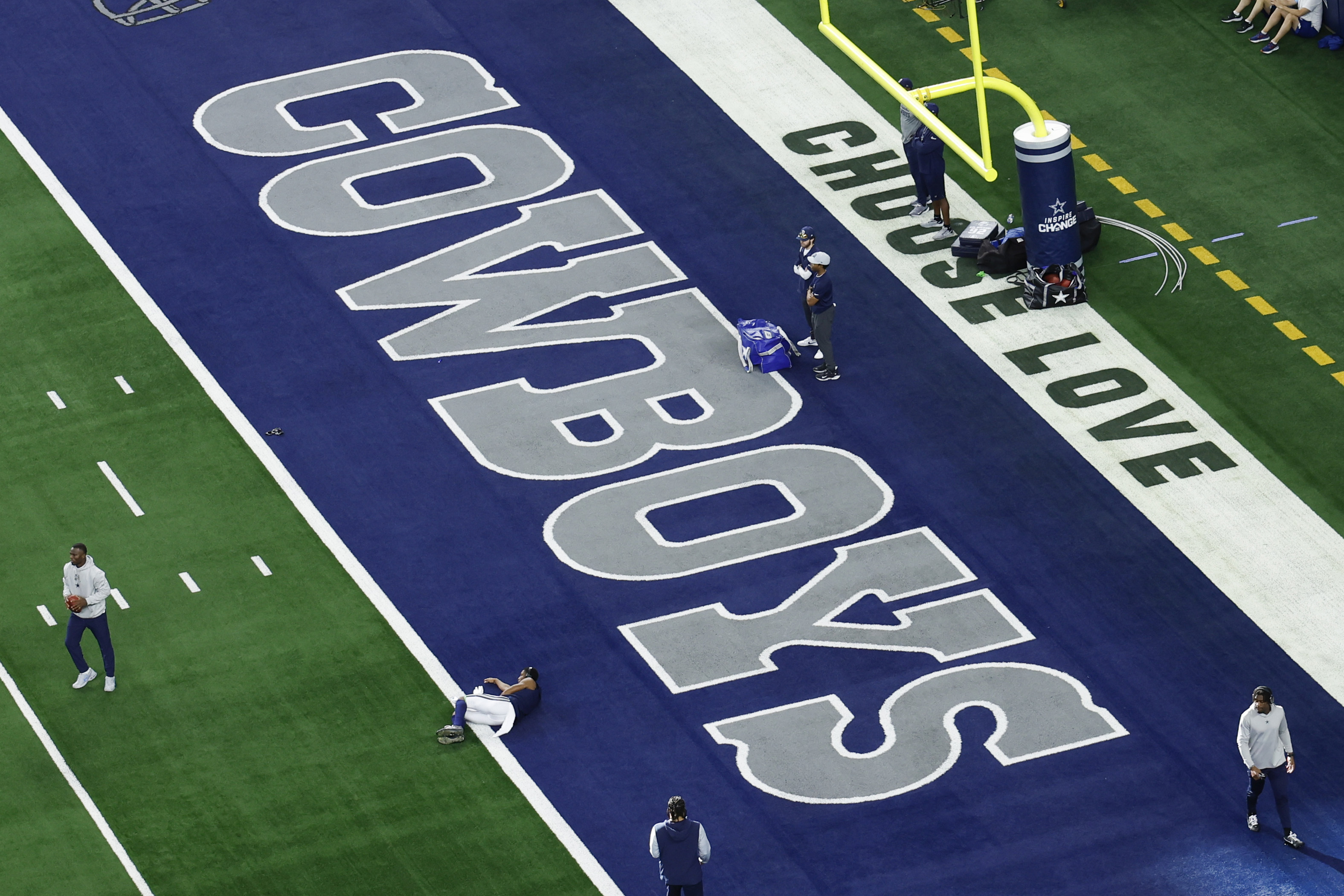 FILE - The word's "Choose Love" are displayed in the end zone at AT&T Stadium before a NFL football game between the Washington Commanders and the Dallas Cowboys on Sunday, Jan. 5, 2025, in Arlington, Texas. 