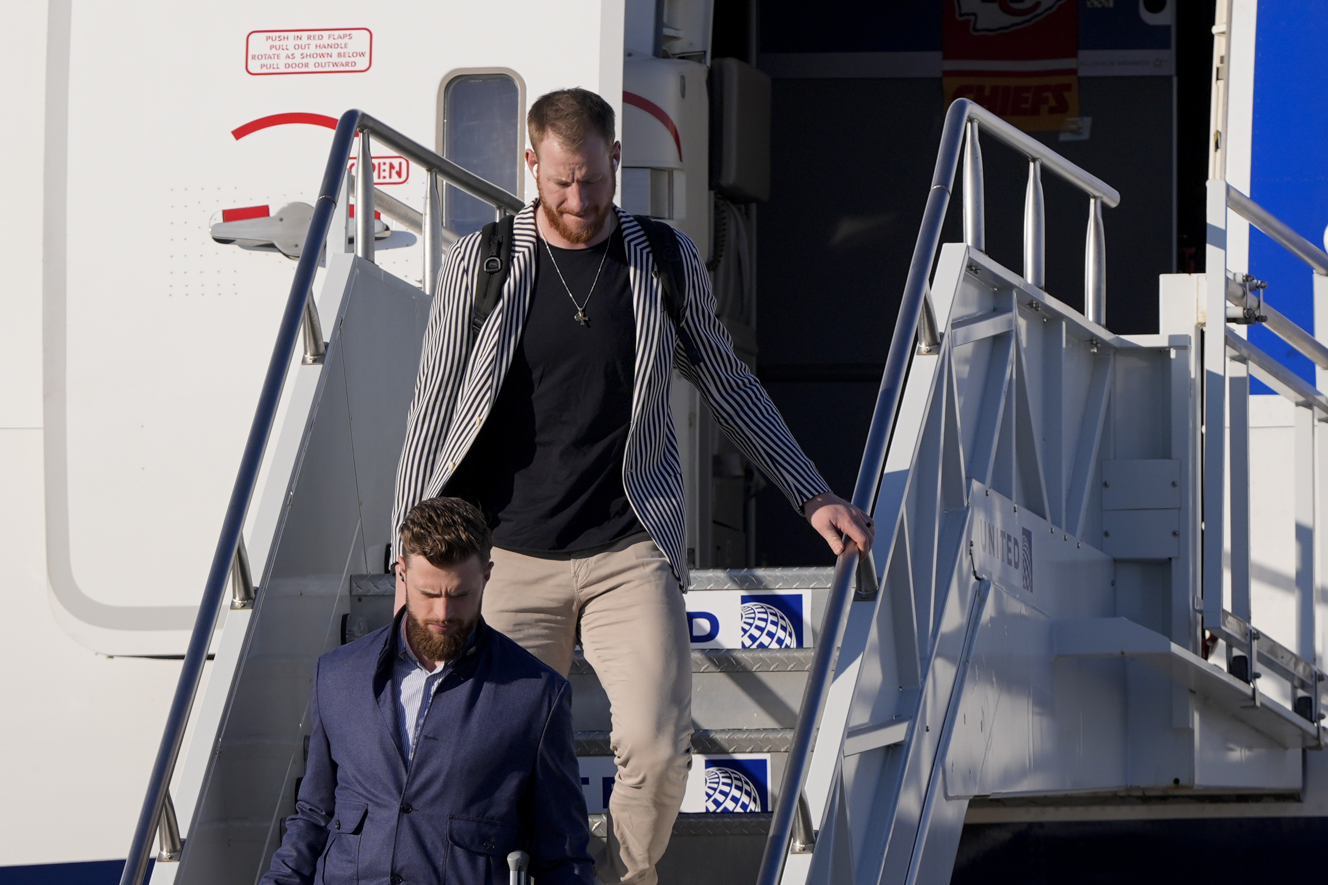Kansas City Chiefs quarterback Carson Wentz arrives at New Orleans international airport, Sunday, Feb. 2, 2025, in Kenner, La. ahead of the NFL Super Bowl 59 football game between the Philadelphia Eagles and the Kansas City Chiefs.