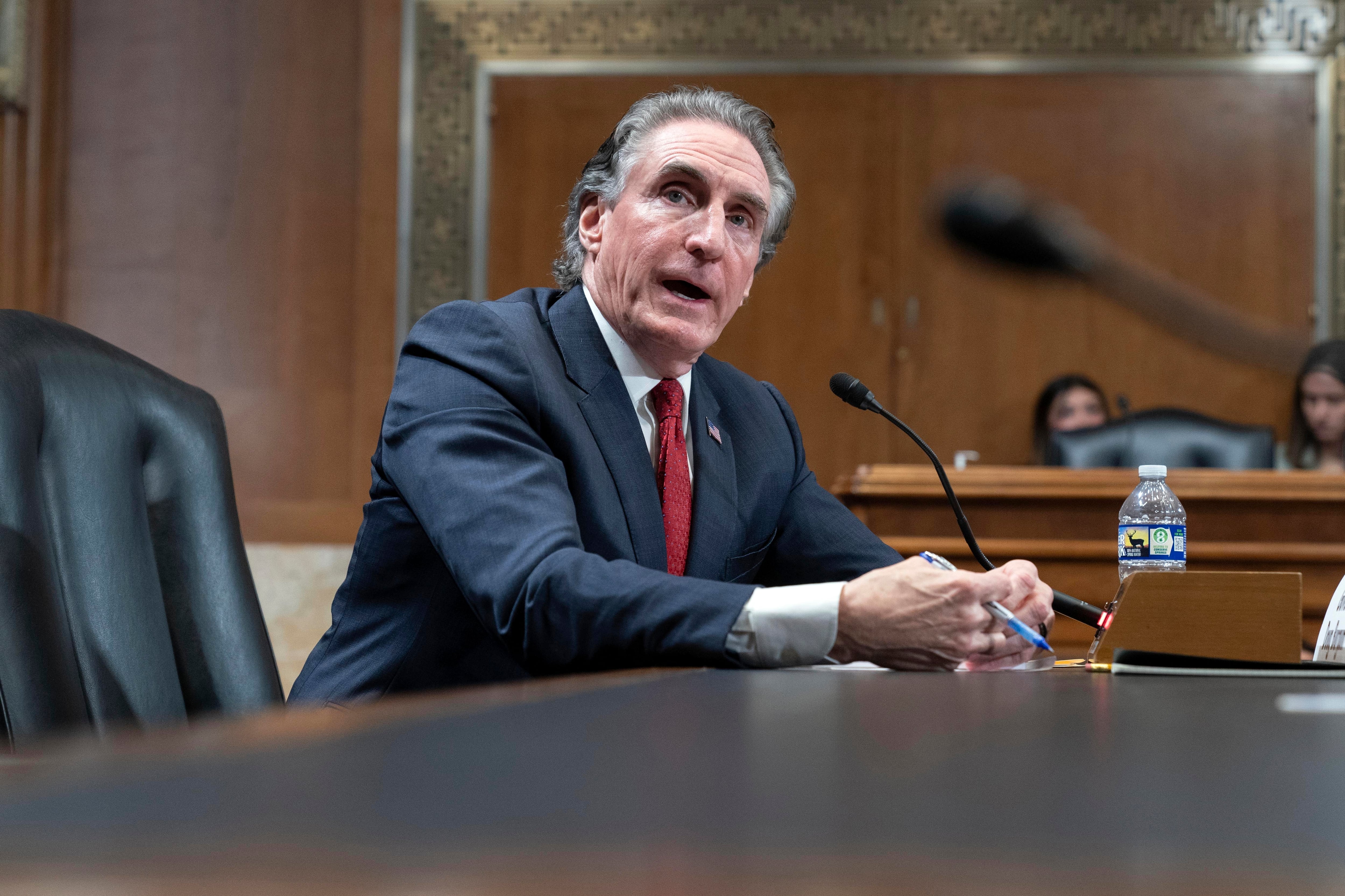 Former Gov. Doug Burgum, President Donald Trump's choice to lead the the Interior Department as Secretary of the Interior, testifies before the Senate Energy and Natural Resources Committee on Capitol Hill in Washington, Jan. 16.