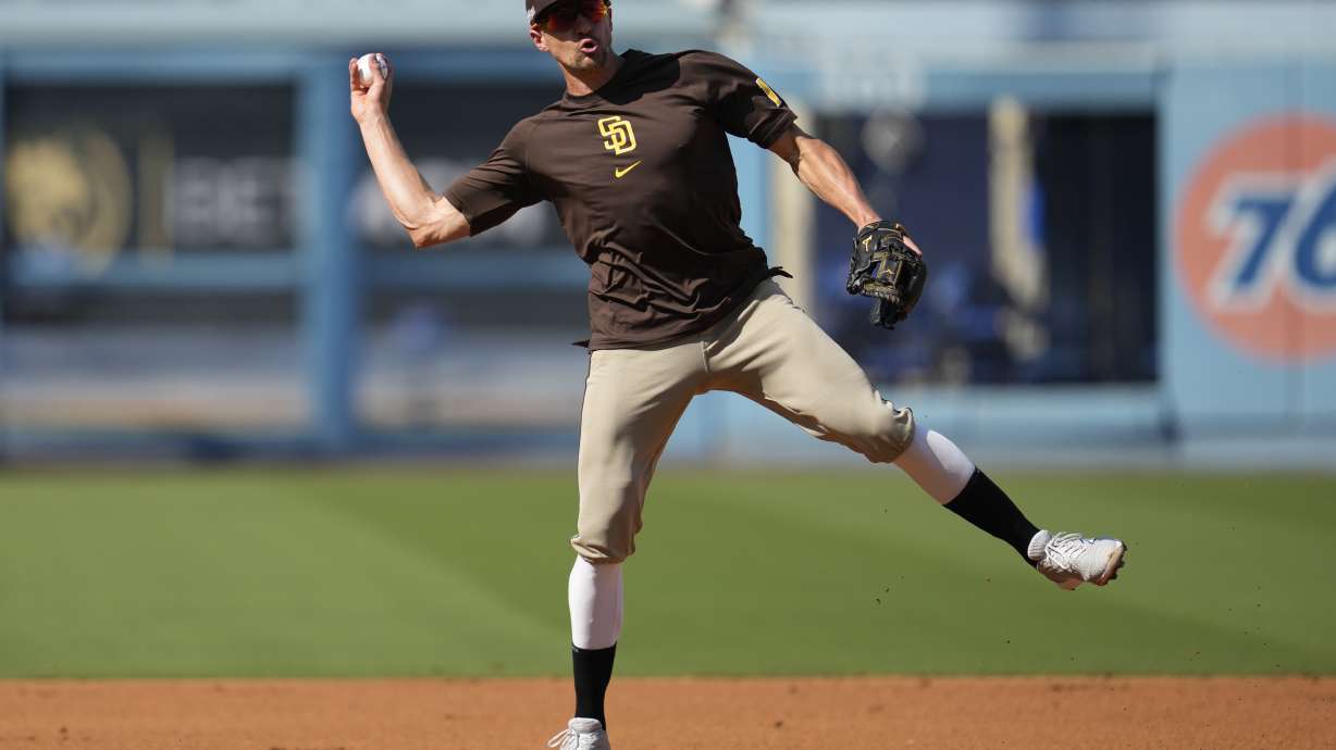 FILE - San Diego Padres shortstop Nick Ahmed works out during practice in preparation for Game 1 of a baseball NL Division Series against the Los Angeles Dodgers in Los Angeles, Friday, Oct. 4, 2024. (AP Photo/Ashley Landis, File