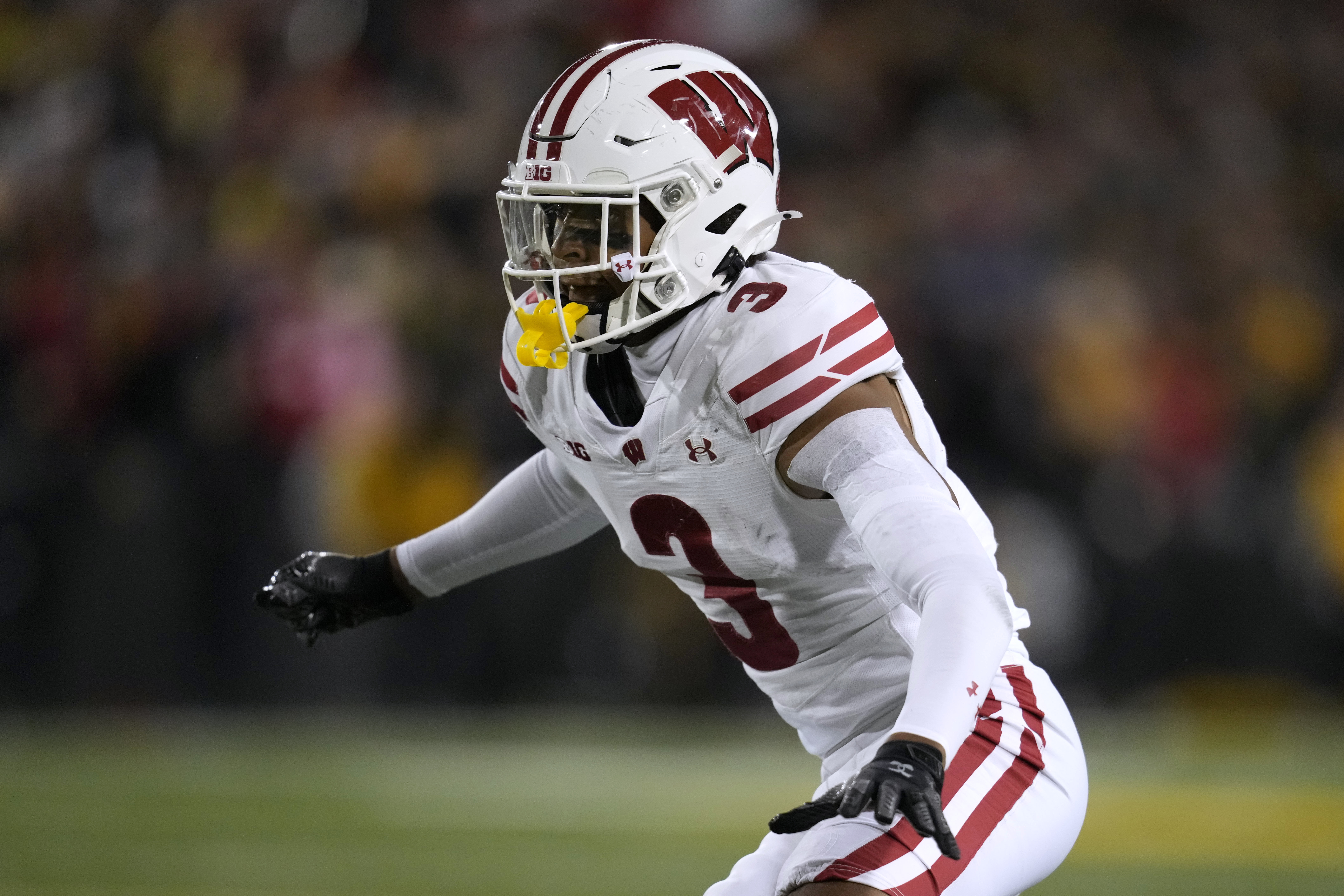 FILE - Wisconsin cornerback Nyzier Fourqurean (3) gets set for a play during the second half of an NCAA college football game against Iowa, Saturday, Nov. 2, 2024, in Iowa City, Iowa. 