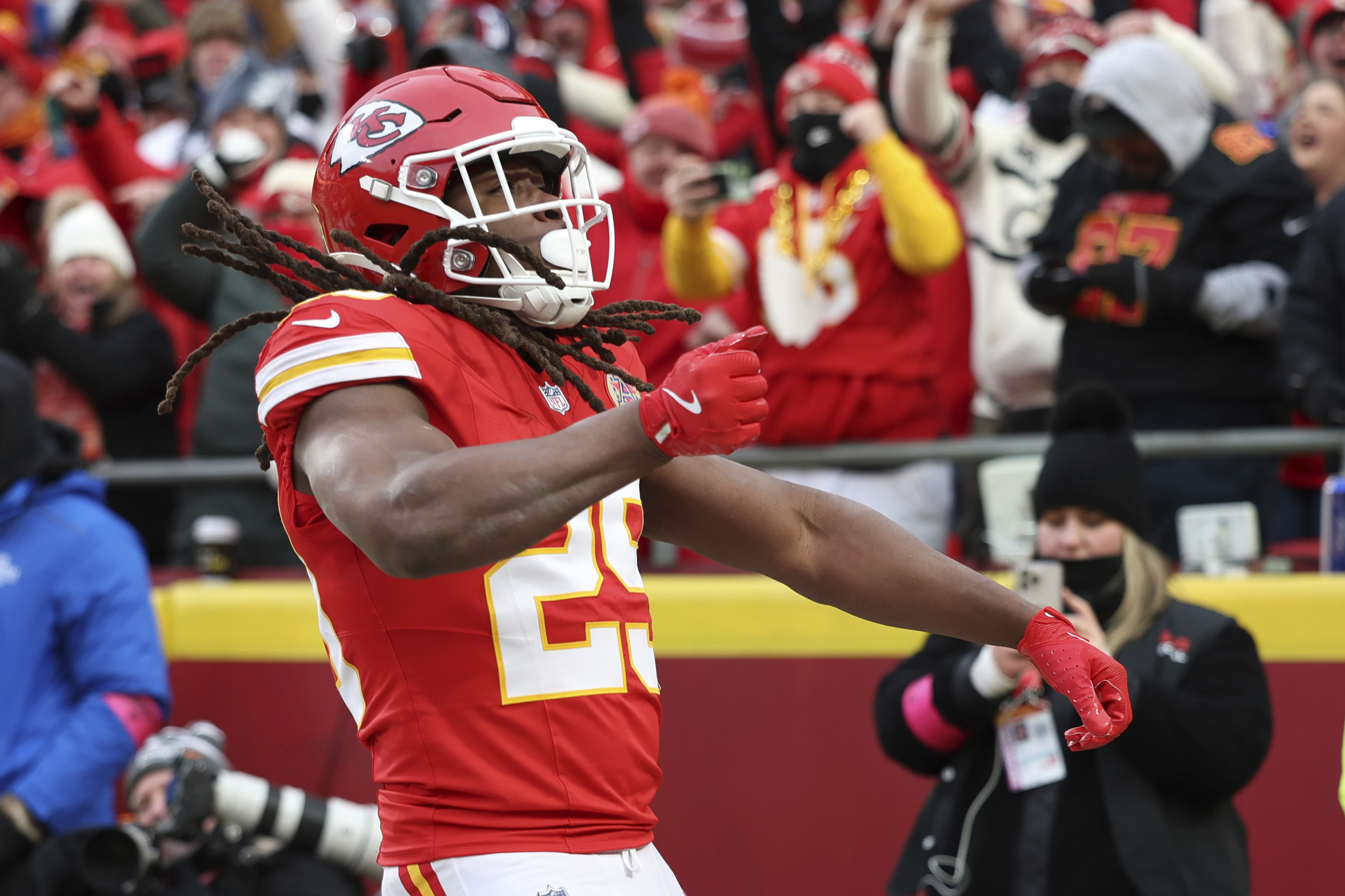 Kansas City Chiefs running back Kareem Hunt celebrates after scoring during the first half of an NFL football AFC divisional playoff game against the Houston Texans Saturday, Jan. 18, 2025, in Kansas City, Mo. 
