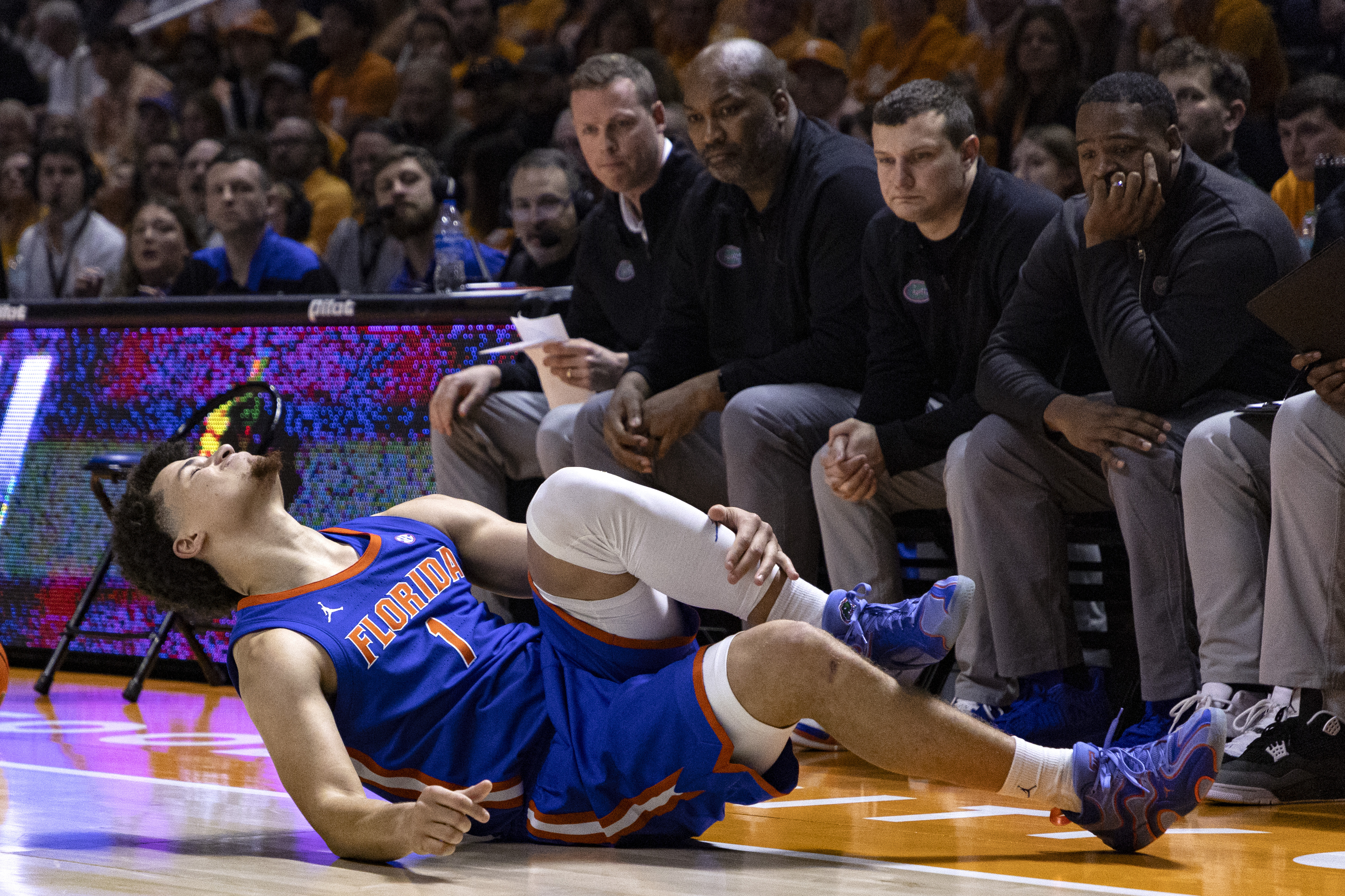 Florida guard Walter Clayton Jr. (1) grimaces as he falls to the floor during the second half of an NCAA college basketball game against Tennessee, Saturday, Feb. 1, 2025, in Knoxville, Tenn. 