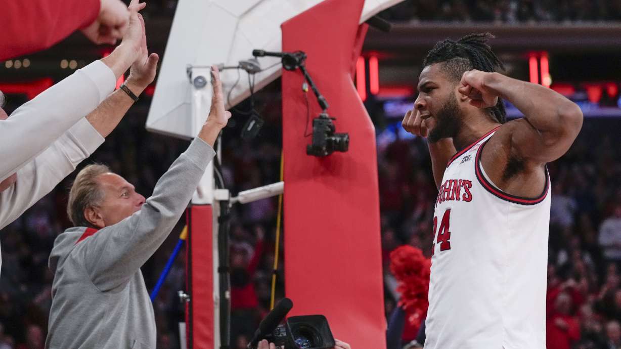 St. John's Zuby Ejiofor, right, reacts to the crowd after drawing a foul during the second half of an NCAA college basketball game against Marquette, Tuesday, Feb. 4, 2025, in New York.
