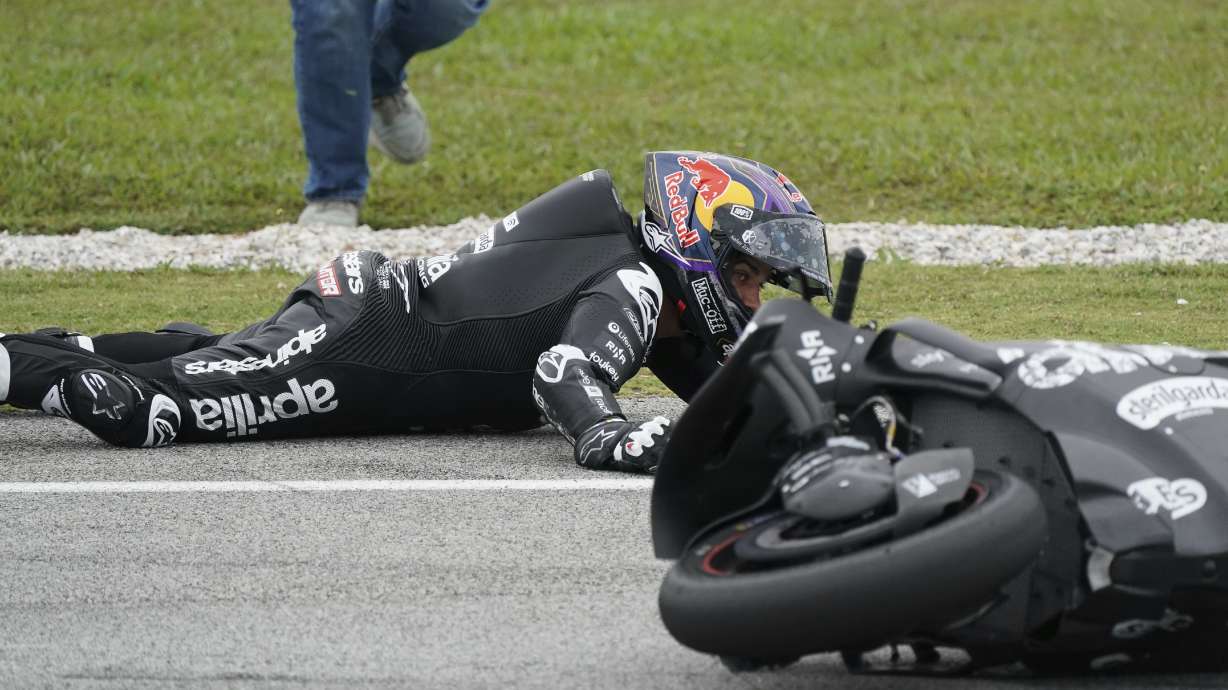 Aprilia Racing's Spanish rider Jorge Martin crashes on second corner during the first day of the 2025 MotoGP pre-season test at the Sepang International Circuit in Sepang, Malaysia, Wednesday, Feb. 5, 2025.