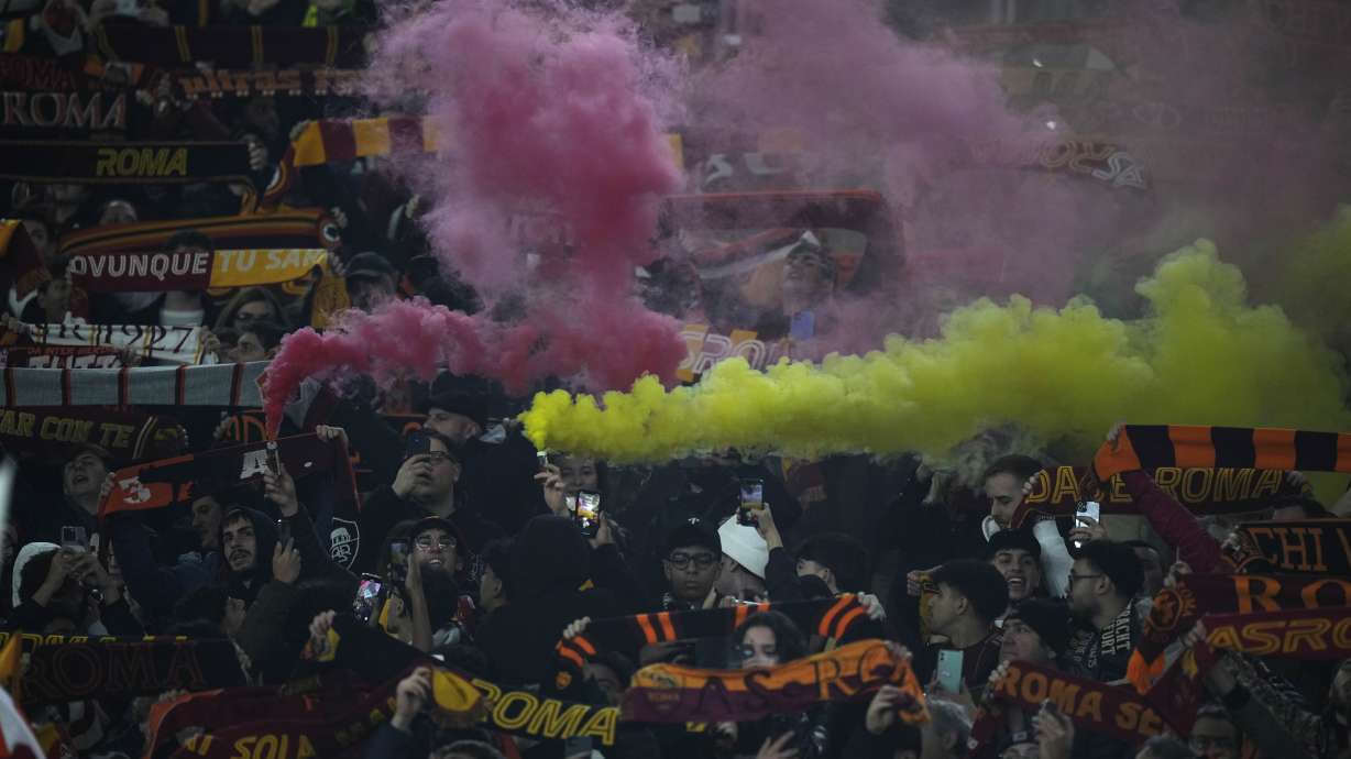 Roma's fan cheer before an Europa League soccer match between Roma and Eintracht Frankfurt, at Rome's Olympic Stadium, Thursday, Jan. 30, 2025.