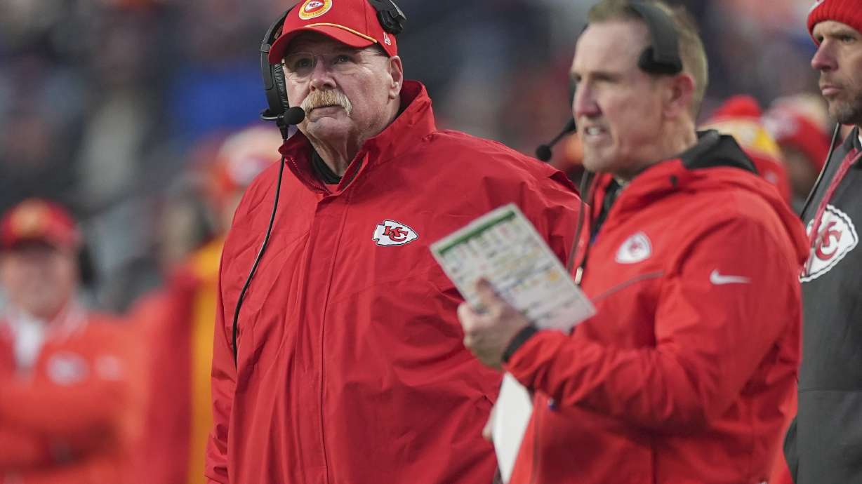 Kansas City Chiefs head coach Andy Reid watches from the sidelines alongside defensive coordinator Steve Spagnuolo, right, during the second half of an NFL football game against the Denver Broncos Sunday, Jan. 5, 2025, in Denver.