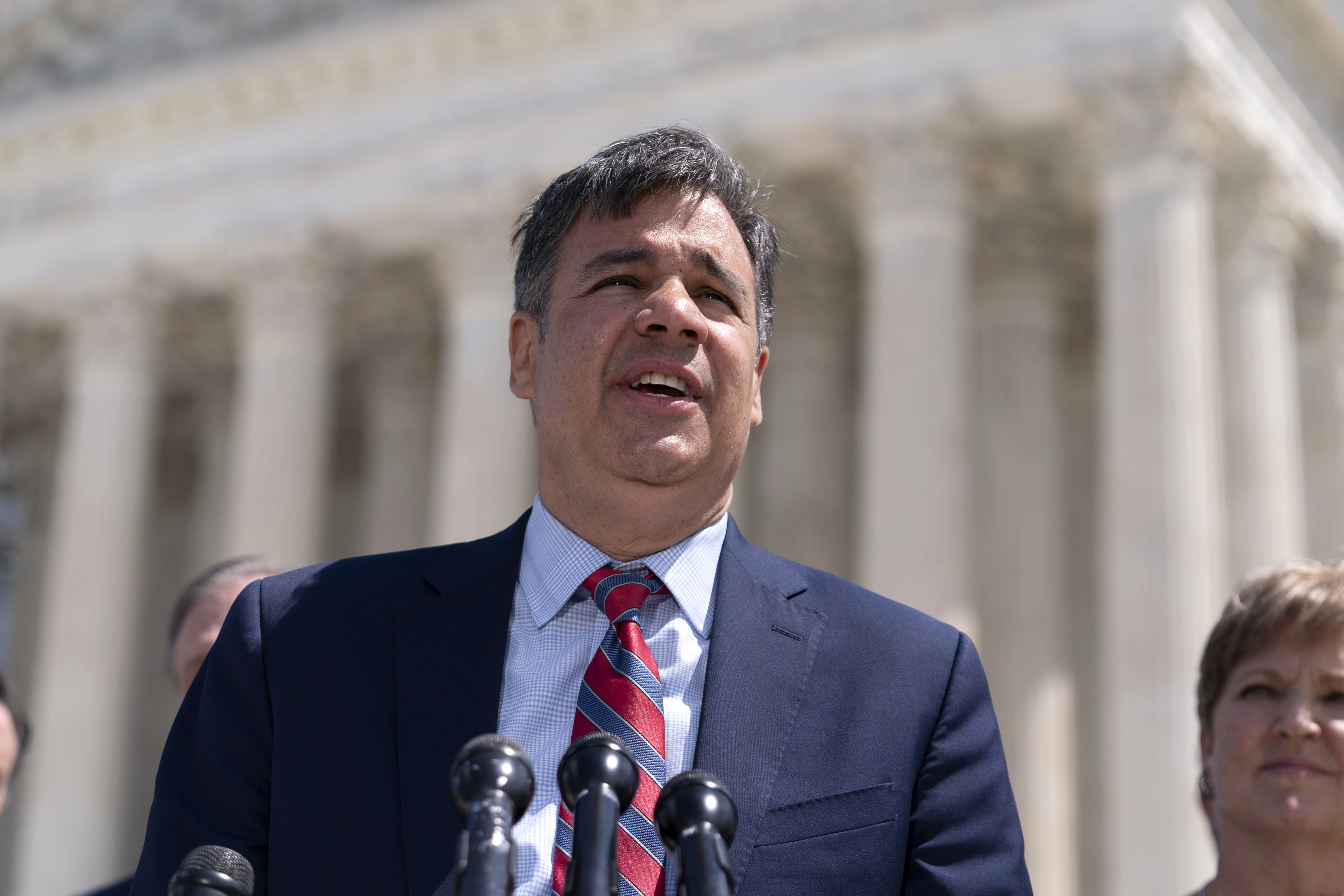 Idaho Attorney General Raúl Labrador talks to reporters outside the Supreme Court, April 24, 2024, in Washington. Idaho officials are being sued over a law that forces libraries to keep some books in an adults-only section if community members believe they are harmful to minors.