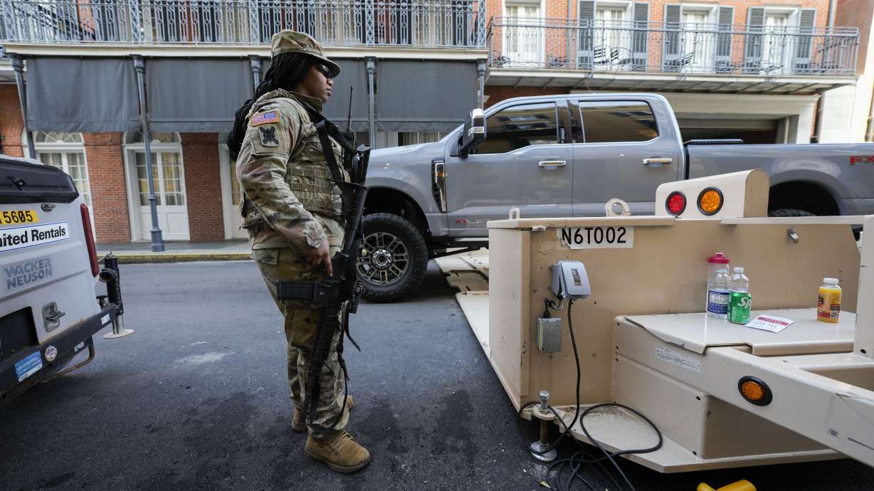 CORRECTS DATE OF SUPER BOWL - Louisiana National Guard specialist Janyria Cutno mans a post at a security barrier on Bienville Street near Bourbon Street in the French Quarter Monday, Feb. 3, 2025, in advance of the upcoming Super Bowl to be played Sunday, Feb. 9th, in New Orleans.