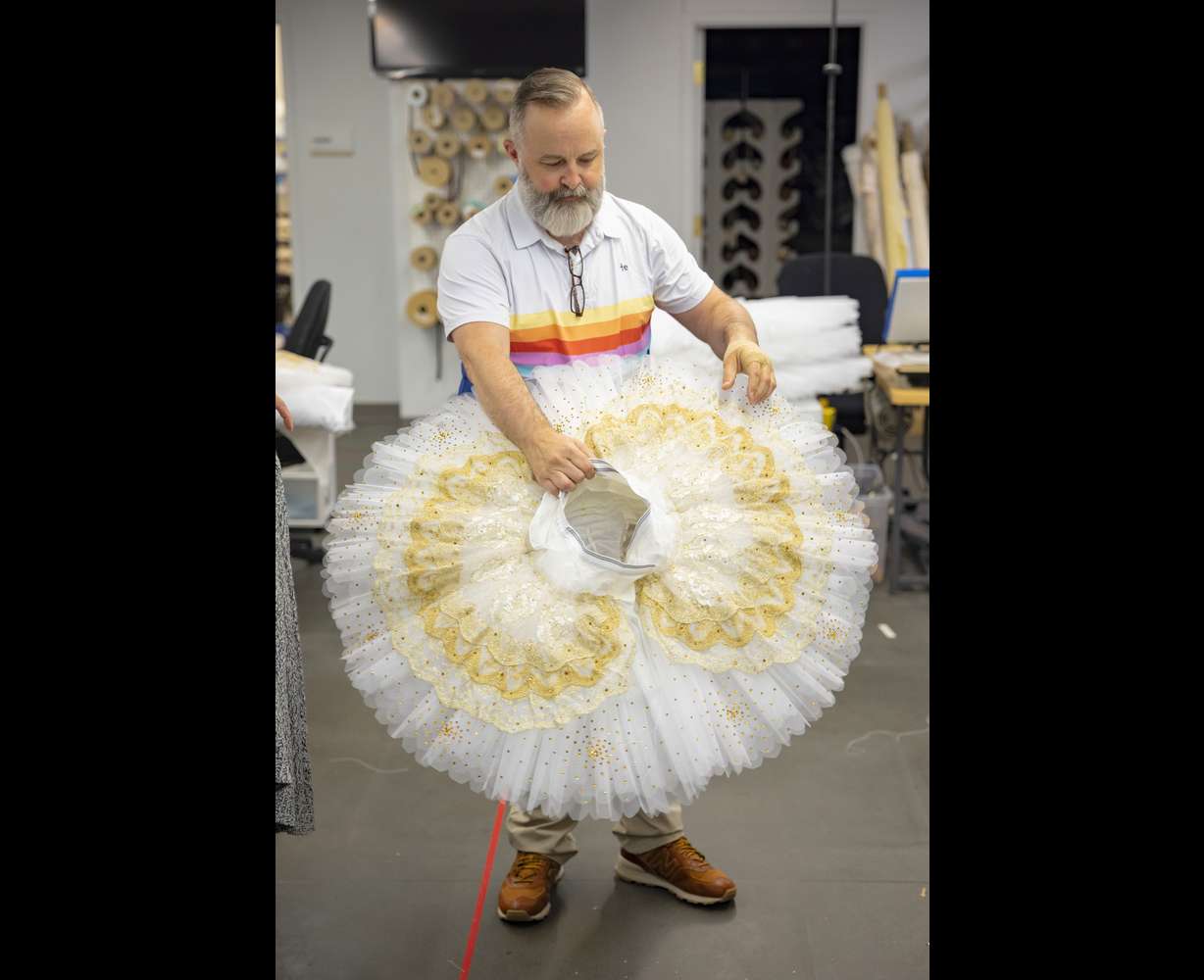 Ballet West costume director Jason Hadley shows off a tutu for "Cinderella."
