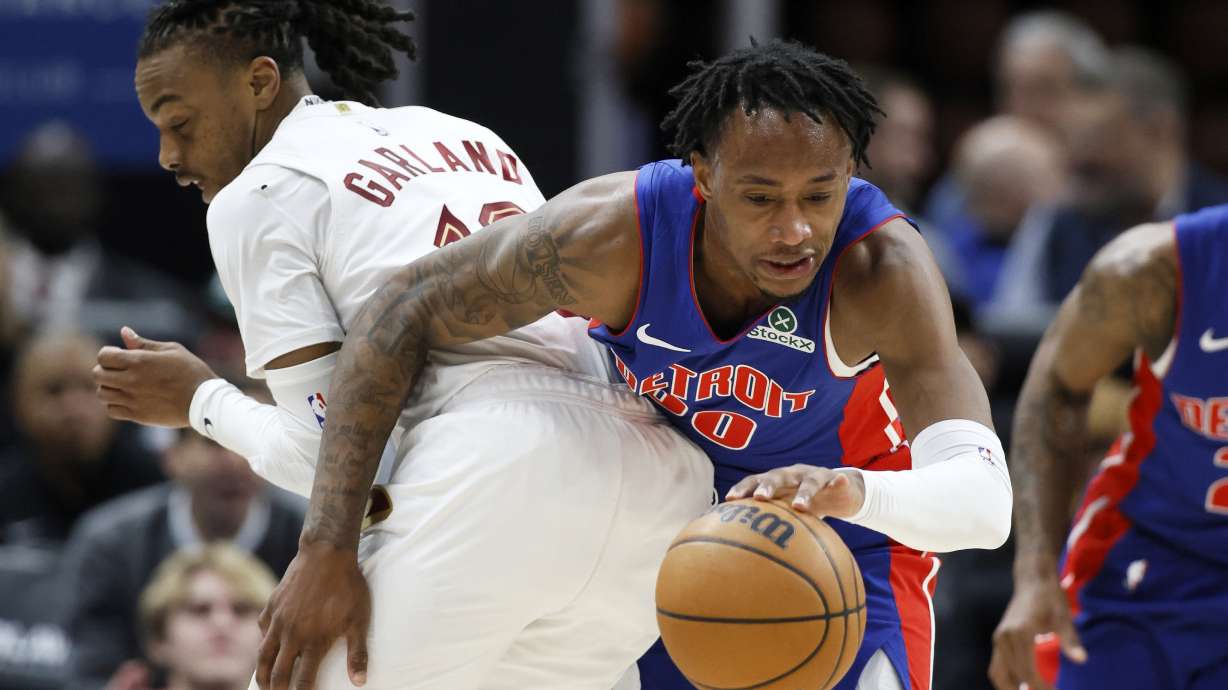 Detroit Pistons forward Ronald Holland II (00) drives the ball up court after stealing it from Cleveland Cavaliers guard Darius Garland during the first half of an NBA basketball game Wednesday, Feb. 5, 2025, in Detroit.