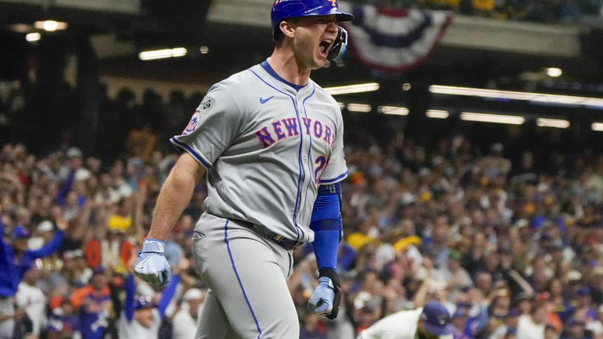 FILE - New York Mets' Pete Alonso reacts after hitting a three-run home run during the ninth inning of Game 3 of a National League wild card baseball game against the Milwaukee Brewers Thursday, Oct. 3, 2024, in Milwaukee.