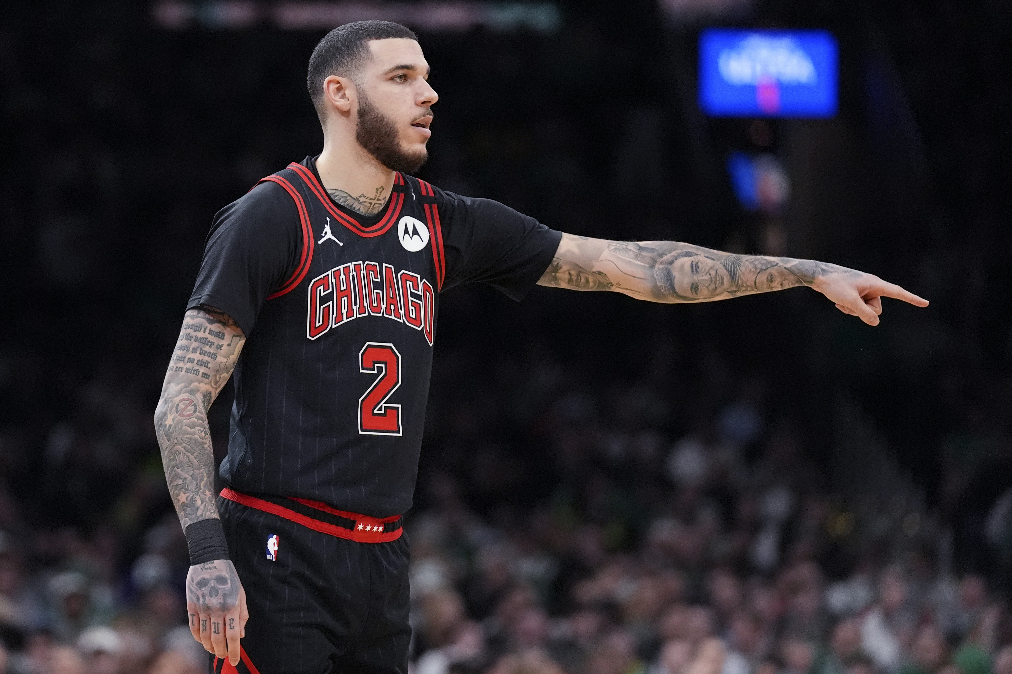 Chicago Bulls guard Lonzo Ball (2) calls to his players during the first half of an NBA basketball game against the Boston Celtics, Wednesday, Jan. 29, 2025, in Boston.