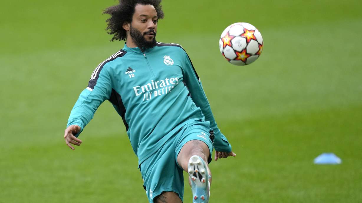 FILE - Real Madrid's Marcelo controls the ball during a training session ahead of Wednesday's Champions League first-leg quarterfinal soccer match between Chelsea and Real Madrid at Stamford Bridge stadium in London Tuesday, April 5, 2022.