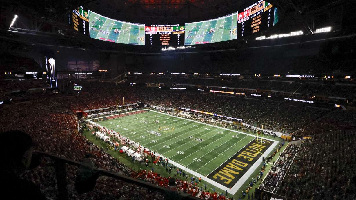 Fans watch during second half of the College Football Playoff national championship game between Ohio State and Notre Dame Monday, Jan. 20, 2025, in Atlanta.
